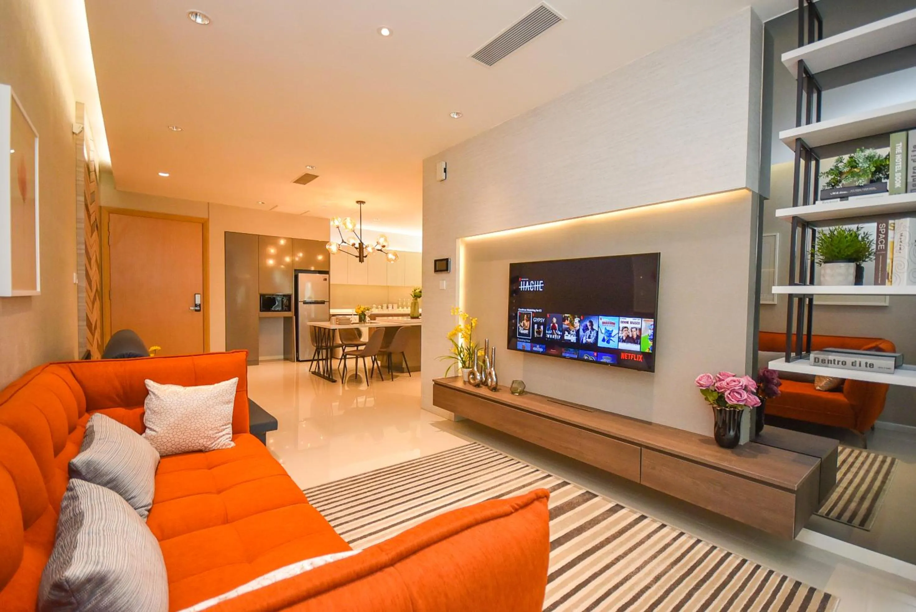 Living room in Suasana Residence by Nest Home