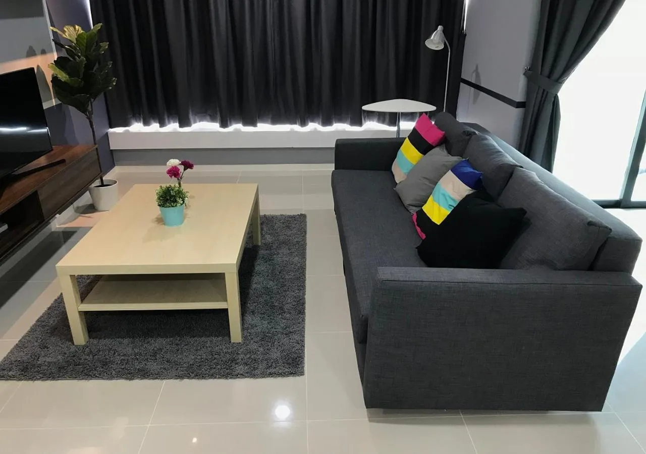 Living room in Suasana Residence by Nest Home