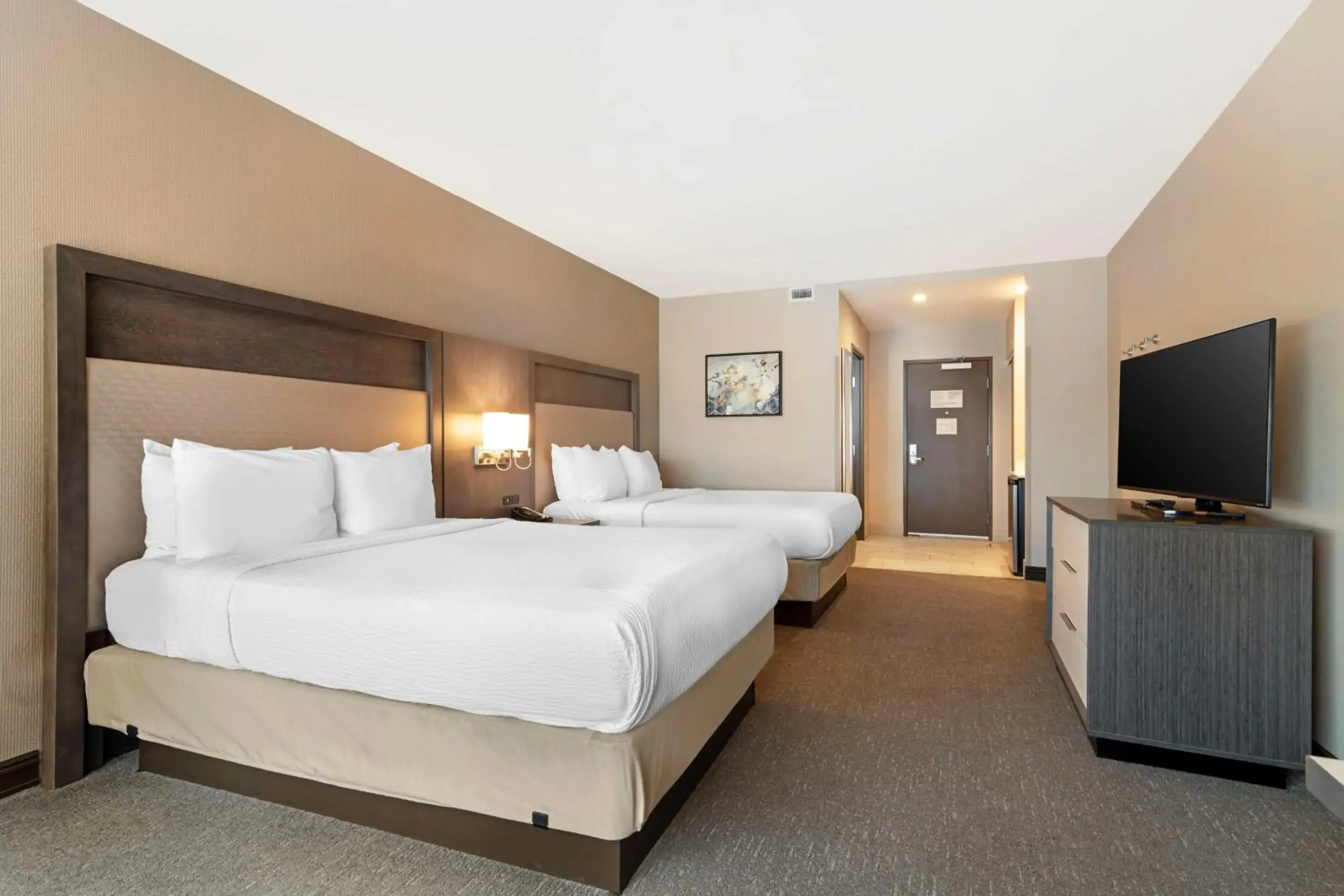 Queen Room with Two Queen Beds and Kitchenette in Best Western Plus Executive Residency Rigby's Water World Hotel Queen Room with Two Queen Beds and Kitchenette in Best Western Plus Executive Residency Rigby's Water World Hotel