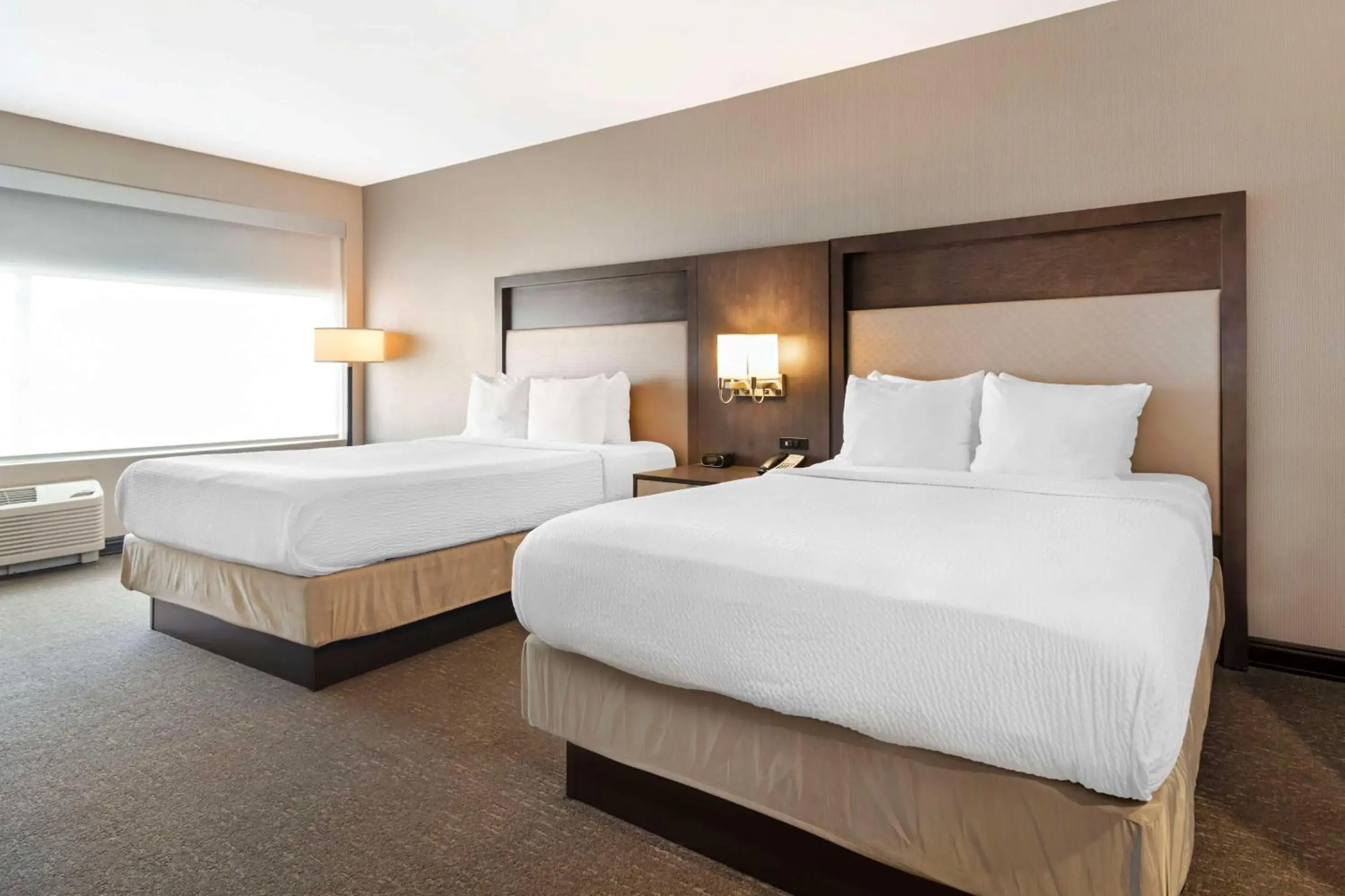 Bedroom, Bed in Best Western Plus Executive Residency Rigby's Water World Hotel Bedroom, Bed in Best Western Plus Executive Residency Rigby's Water World Hotel