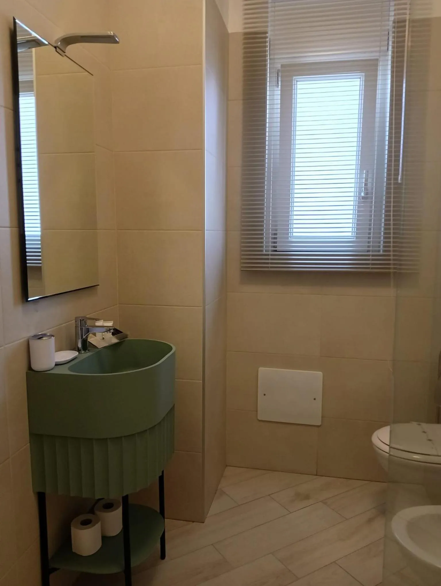 Toilet in BlueBay Residence Resort