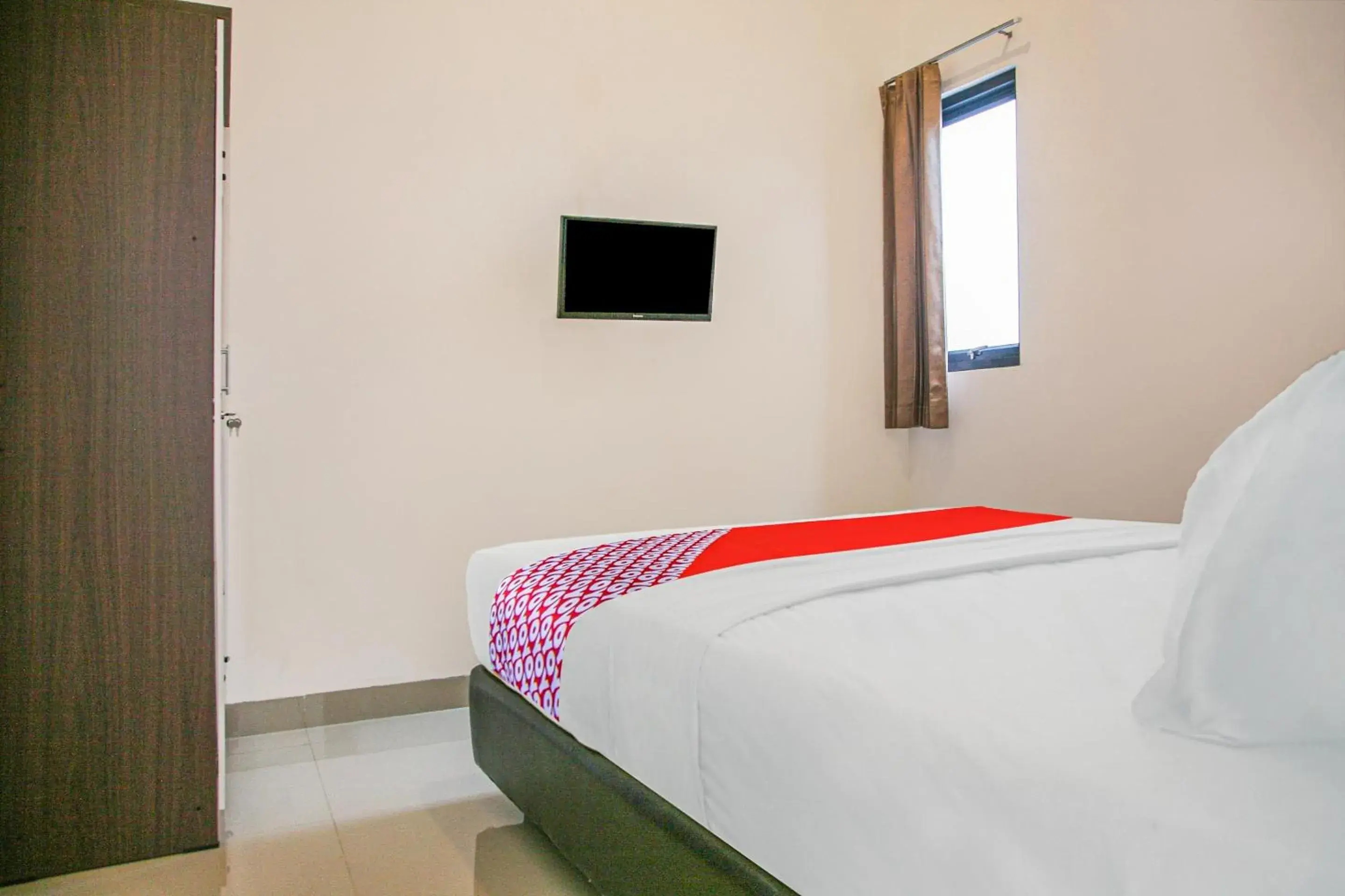 Bedroom in Hotel O Pasir Padi Inn Syariah Bedroom in Hotel O Pasir Padi Inn Syariah