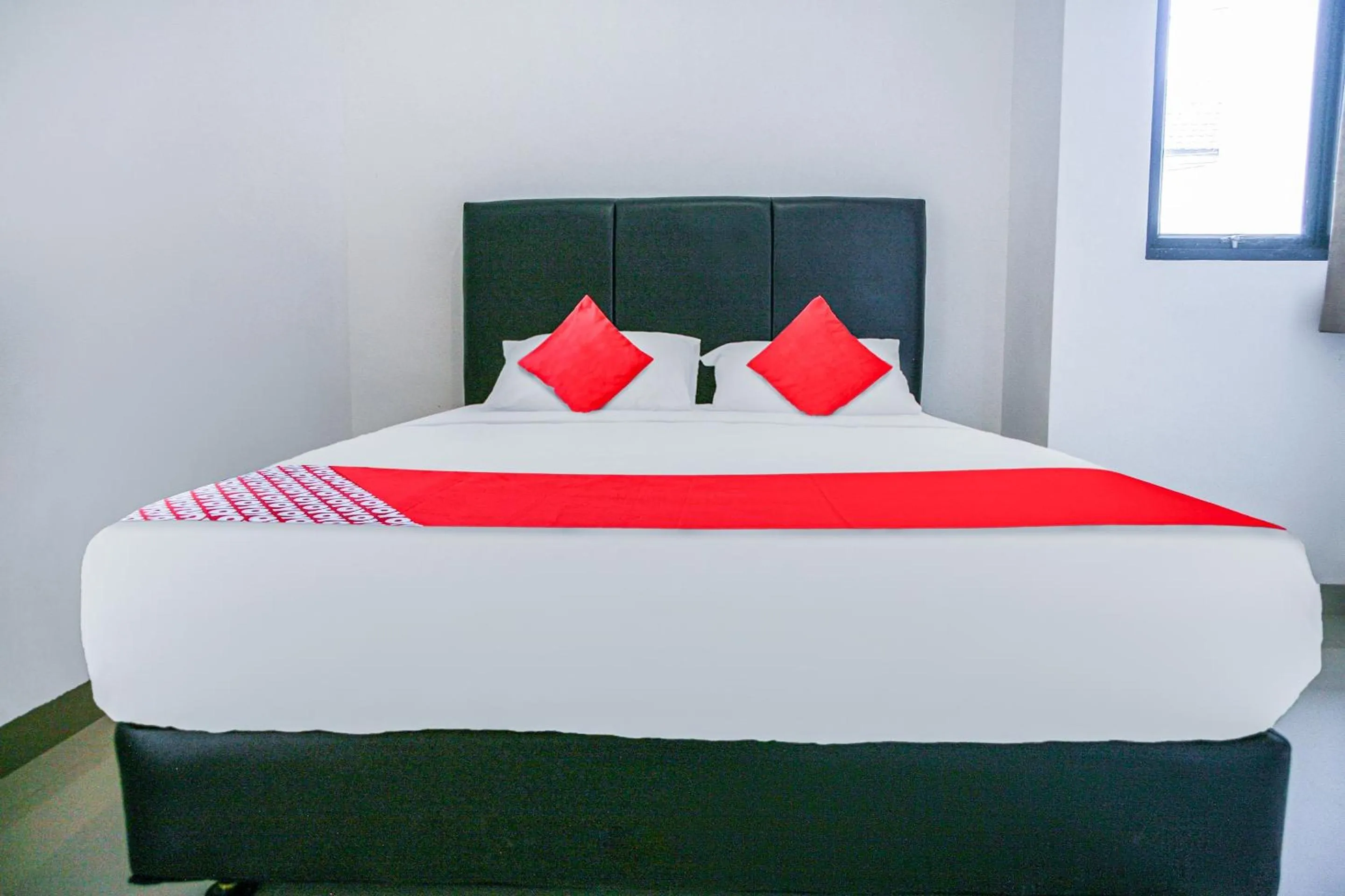 Bedroom in Hotel O Pasir Padi Inn Syariah