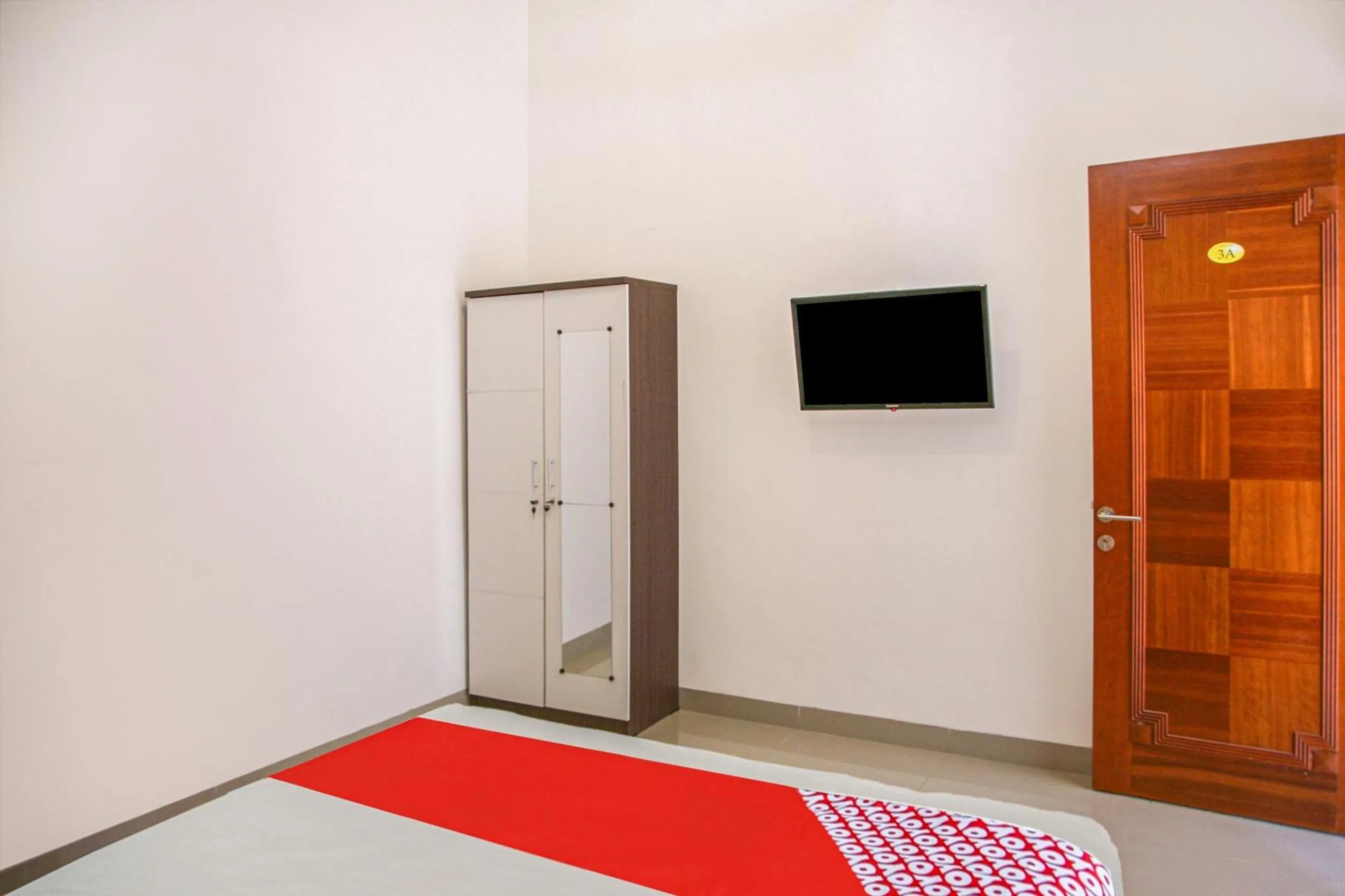 Bedroom in Hotel O Pasir Padi Inn Syariah