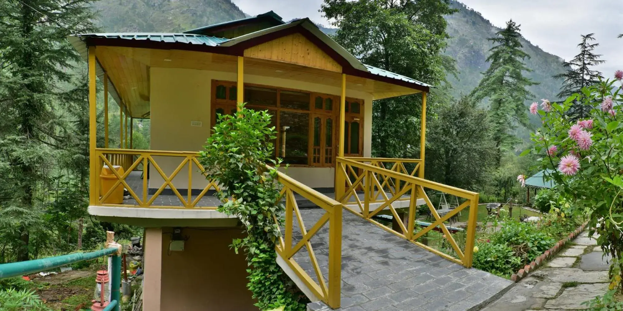 Property building in Parvati Kuteer riverside resort Property building in Parvati Kuteer riverside resort