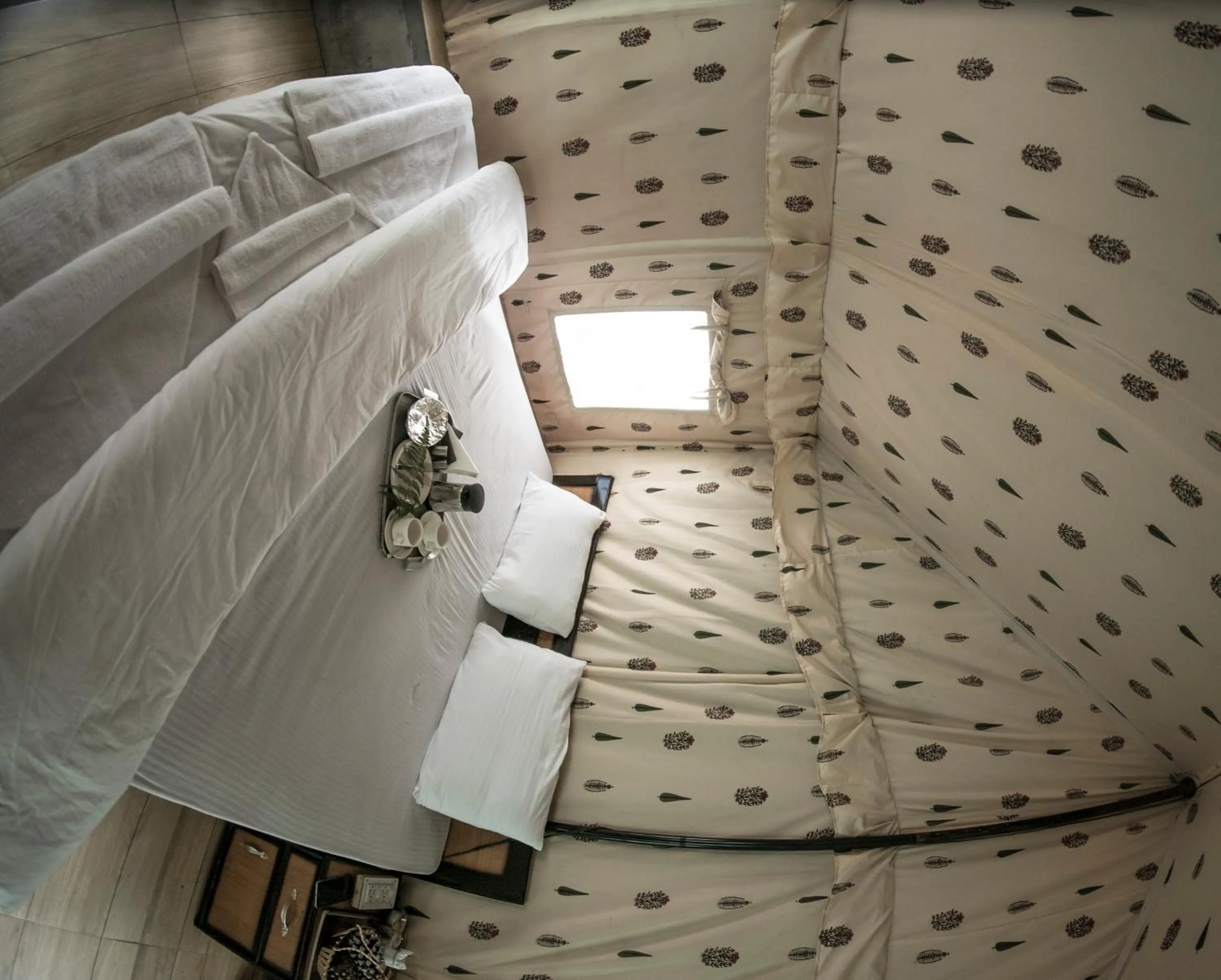 Bed in Parvati Kuteer riverside resort