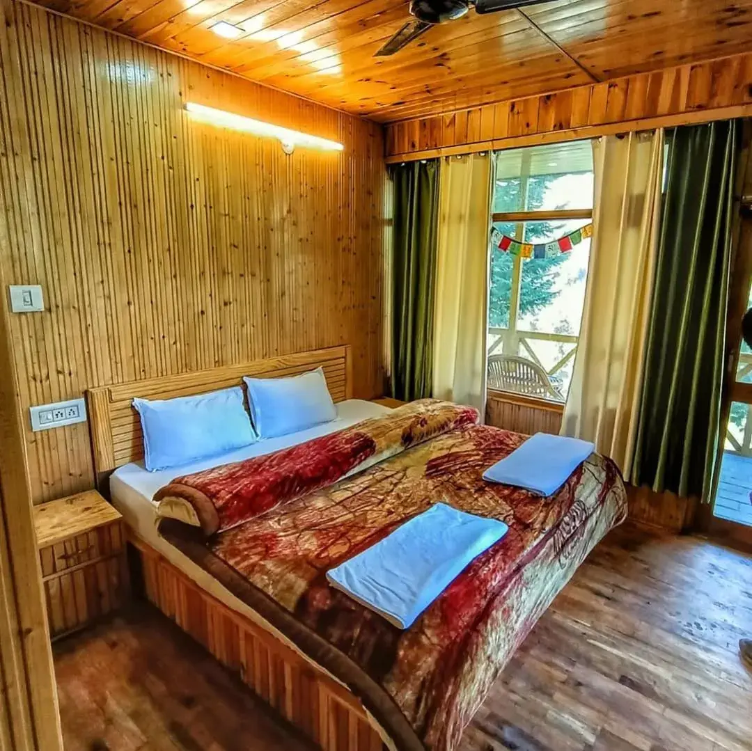 Bed in Parvati Kuteer riverside resort Bed in Parvati Kuteer riverside resort