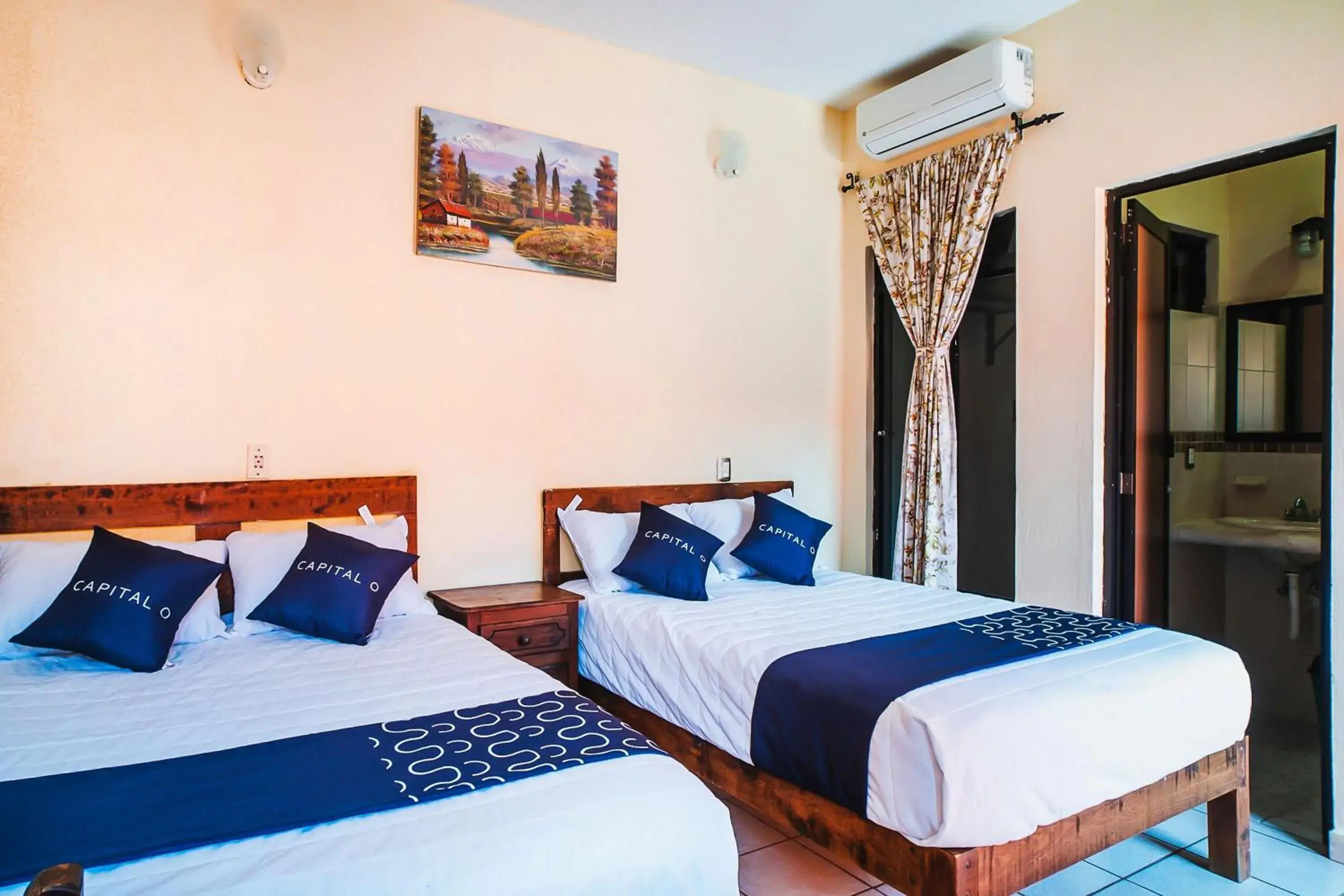 Bed in Capital O Hotel Aurora, Tuxtla Gutiérrez Bed in Capital O Hotel Aurora, Tuxtla Gutiérrez