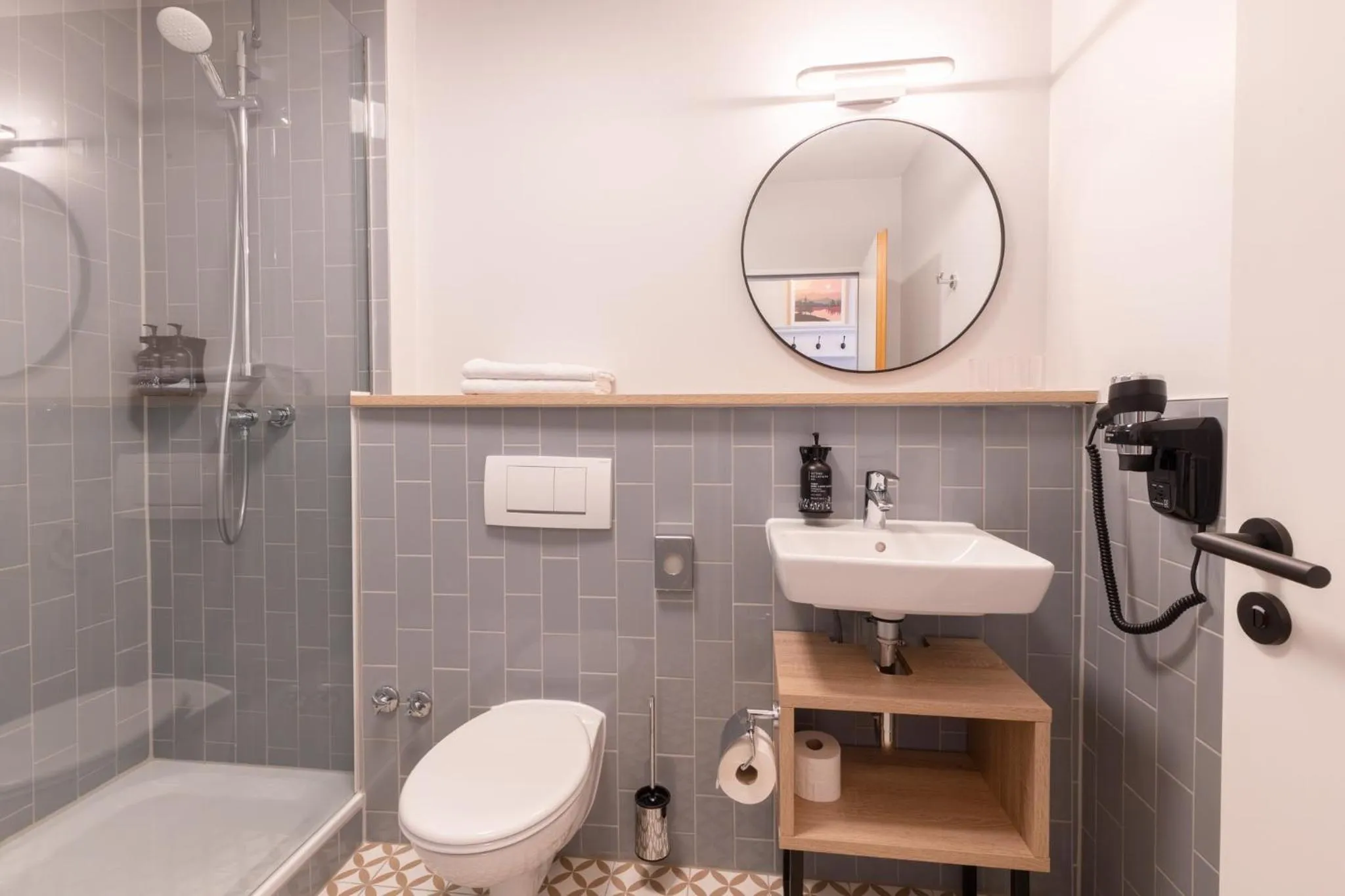 Bathroom in Garner Hotel Mannheim City by IHG