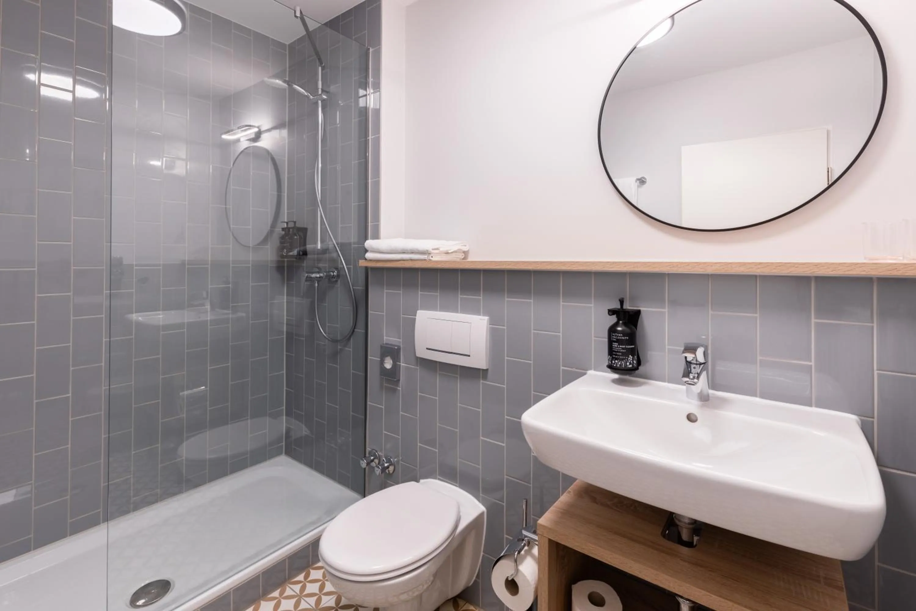 Bathroom in Garner Hotel Mannheim City by IHG