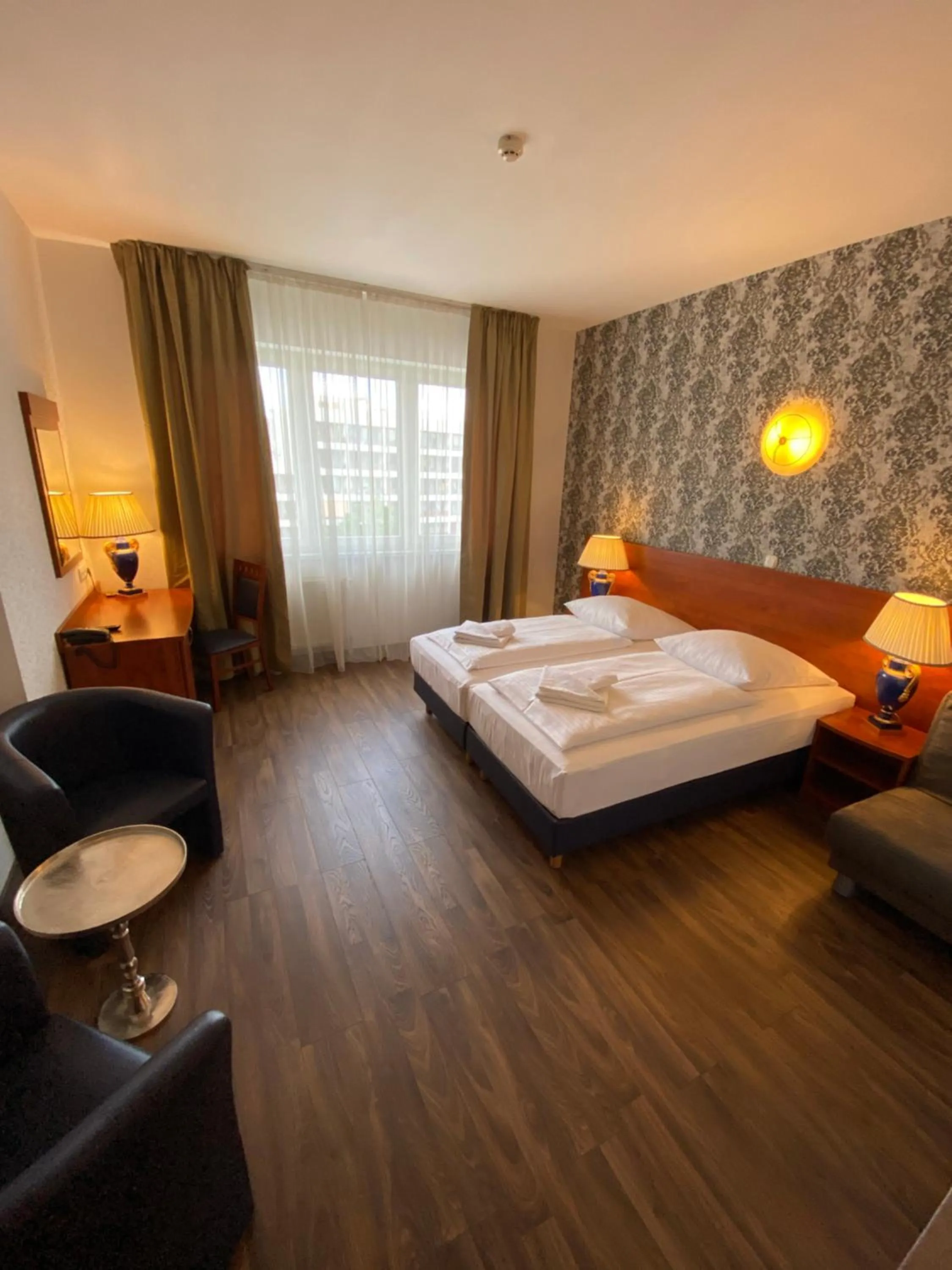 Photo of the whole room, Bed in Hotel Atrium Charlottenburg