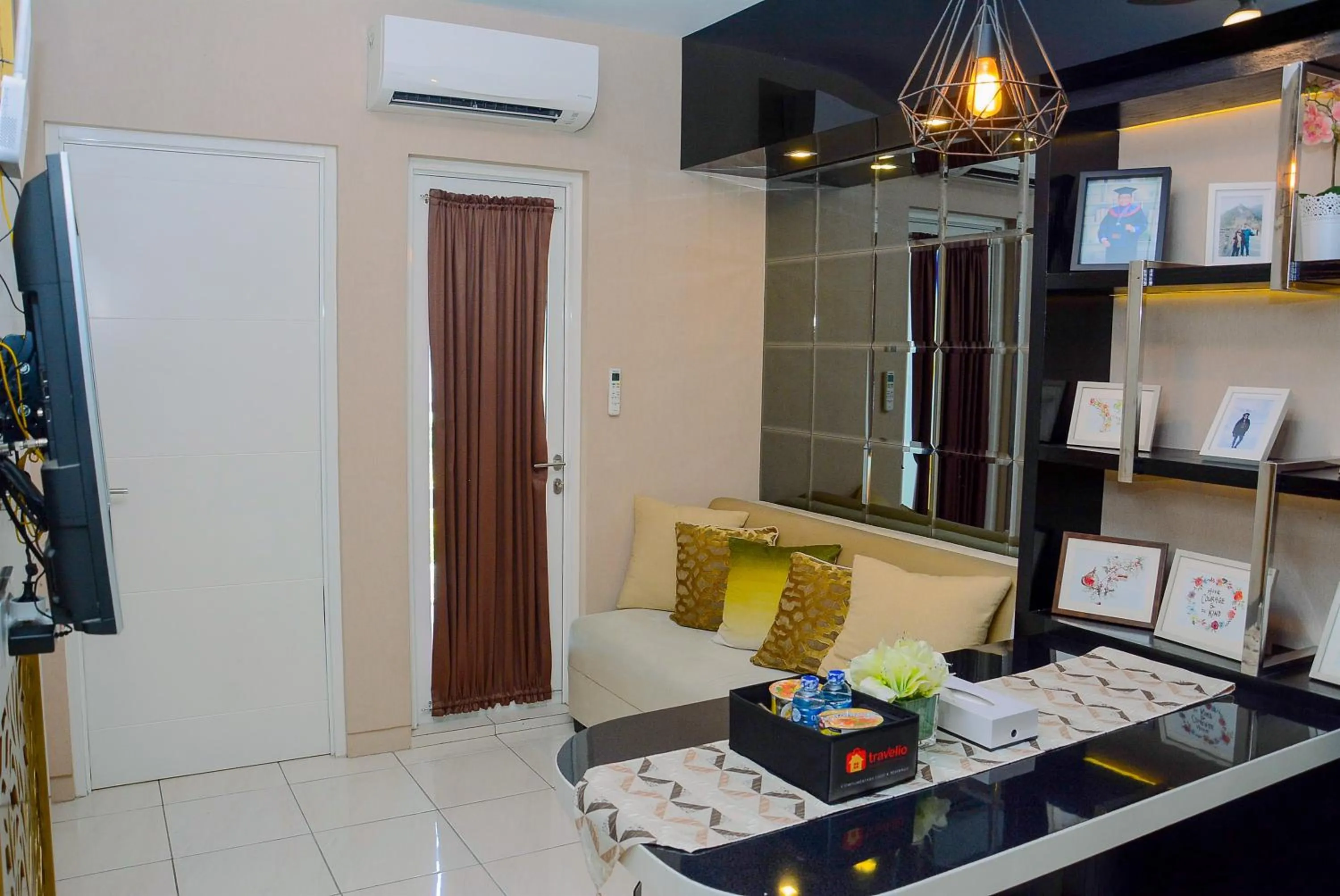 Living room, Bed in Comfy and Luxury 3BR Springlake Apartment By Travelio