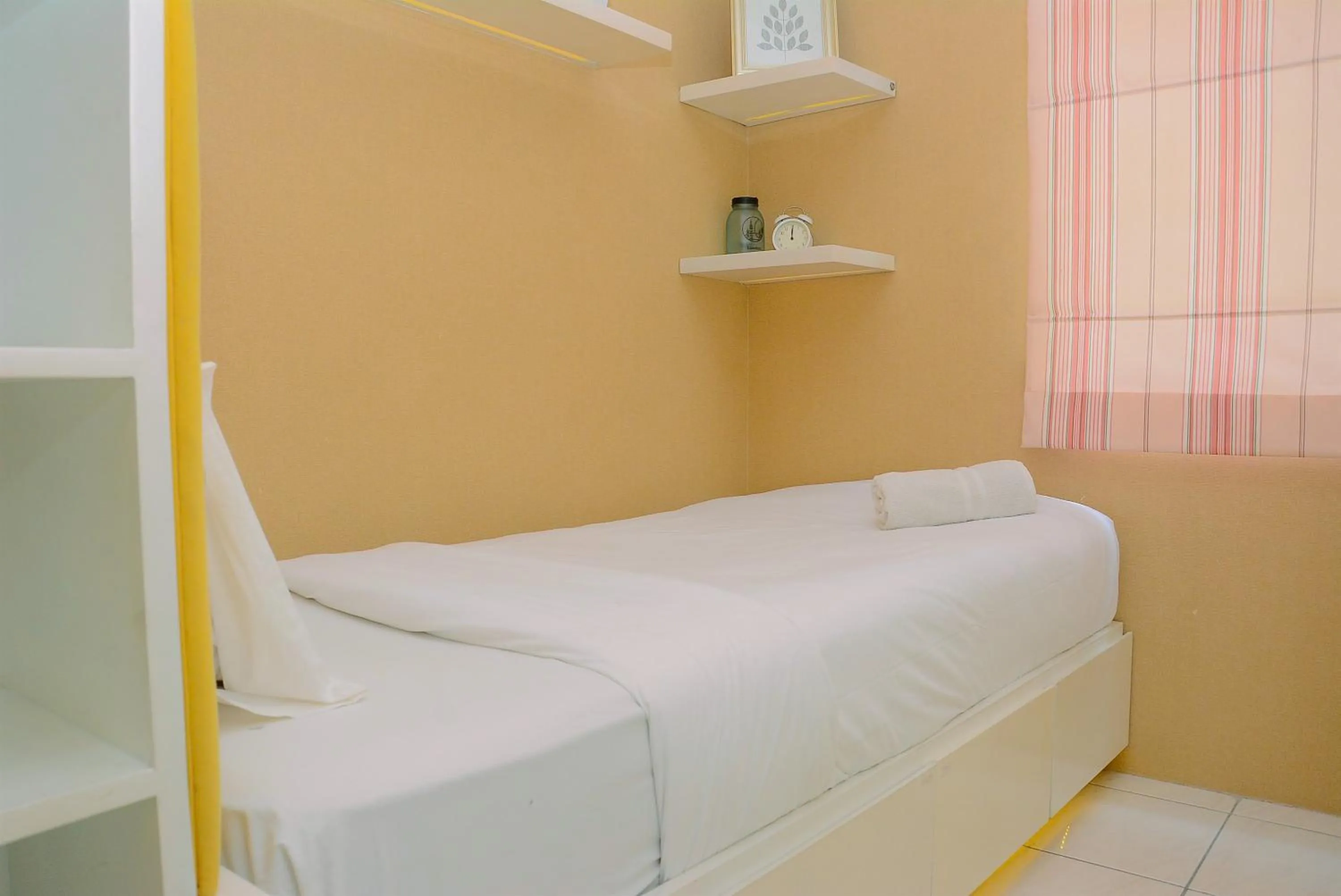 Bed in Comfy and Luxury 3BR Springlake Apartment By Travelio