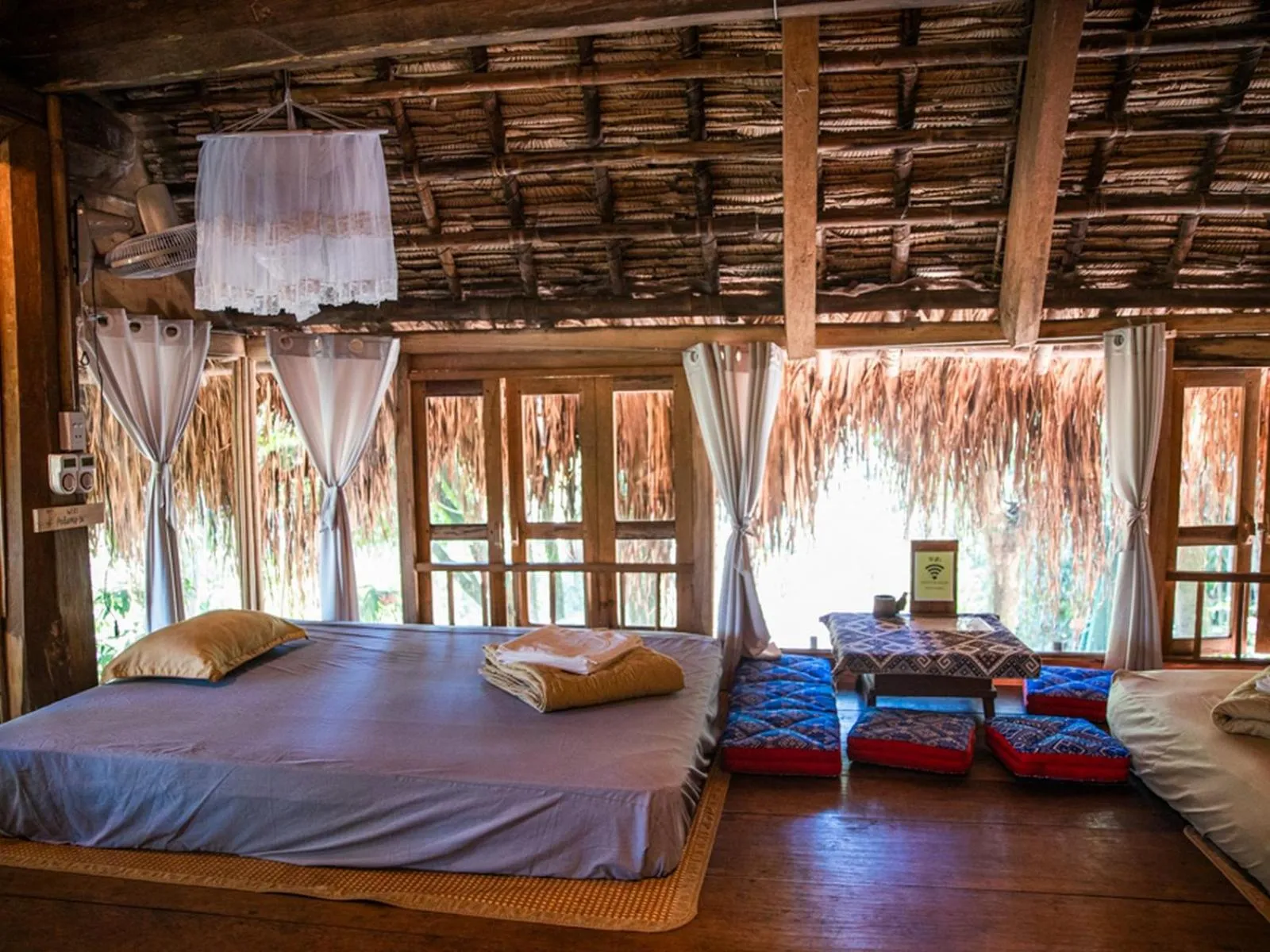 Bed in Pu Luong Jungle Lodge