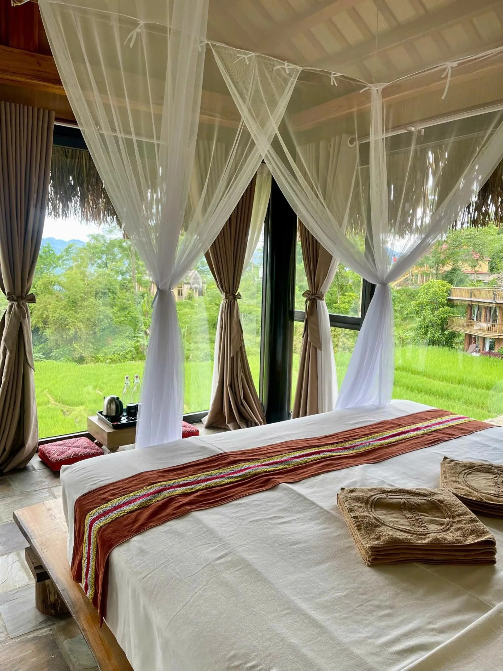 Bed in Pu Luong Jungle Lodge