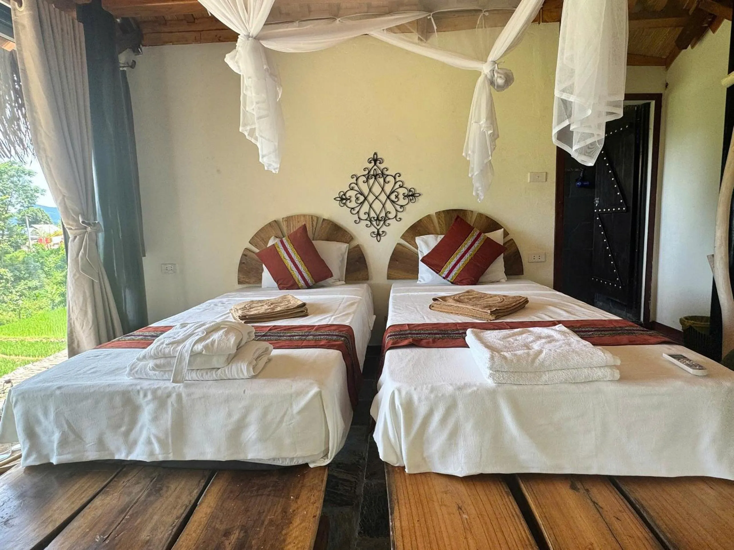 Bed in Pu Luong Jungle Lodge