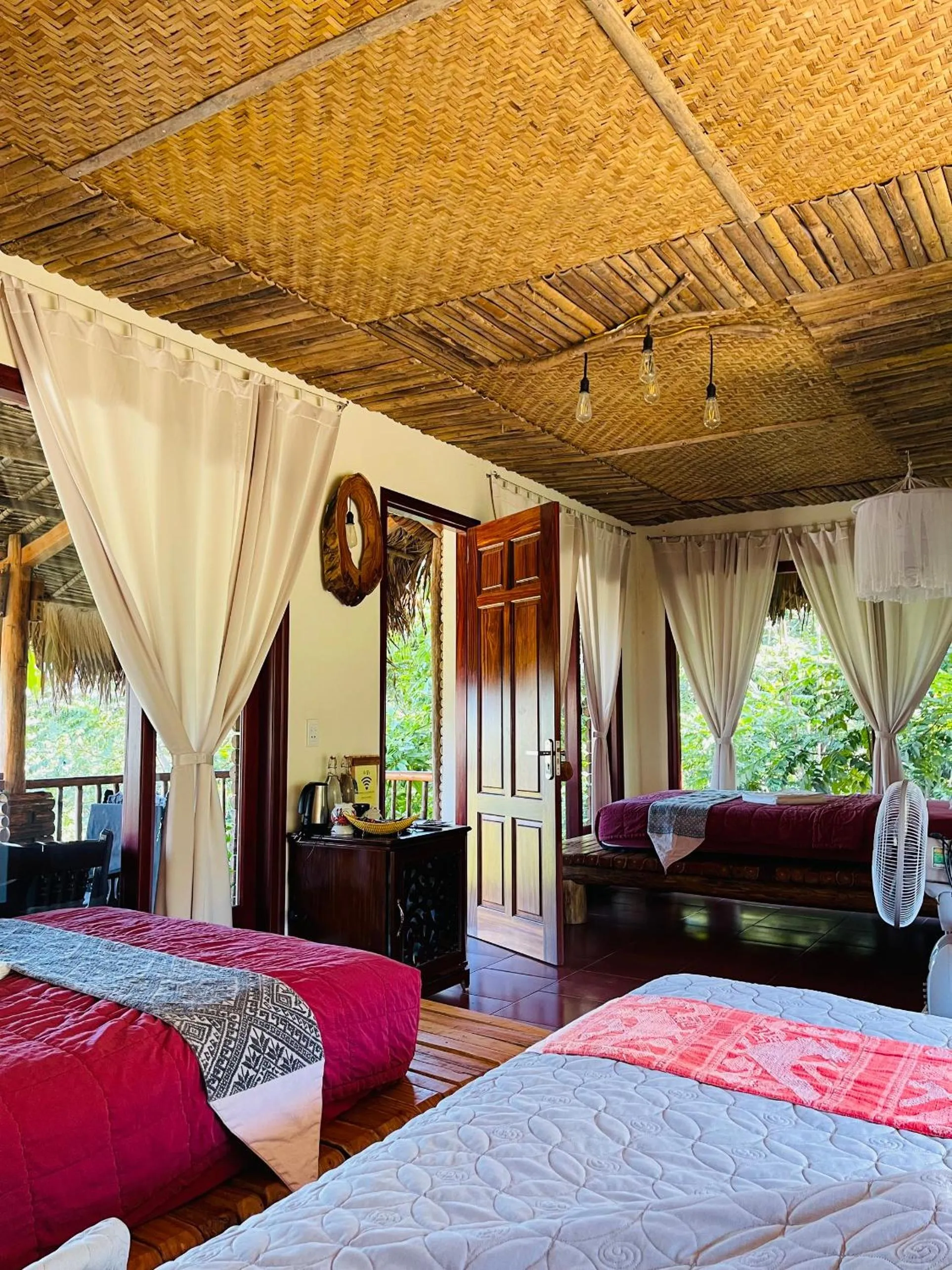 Bed in Pu Luong Jungle Lodge