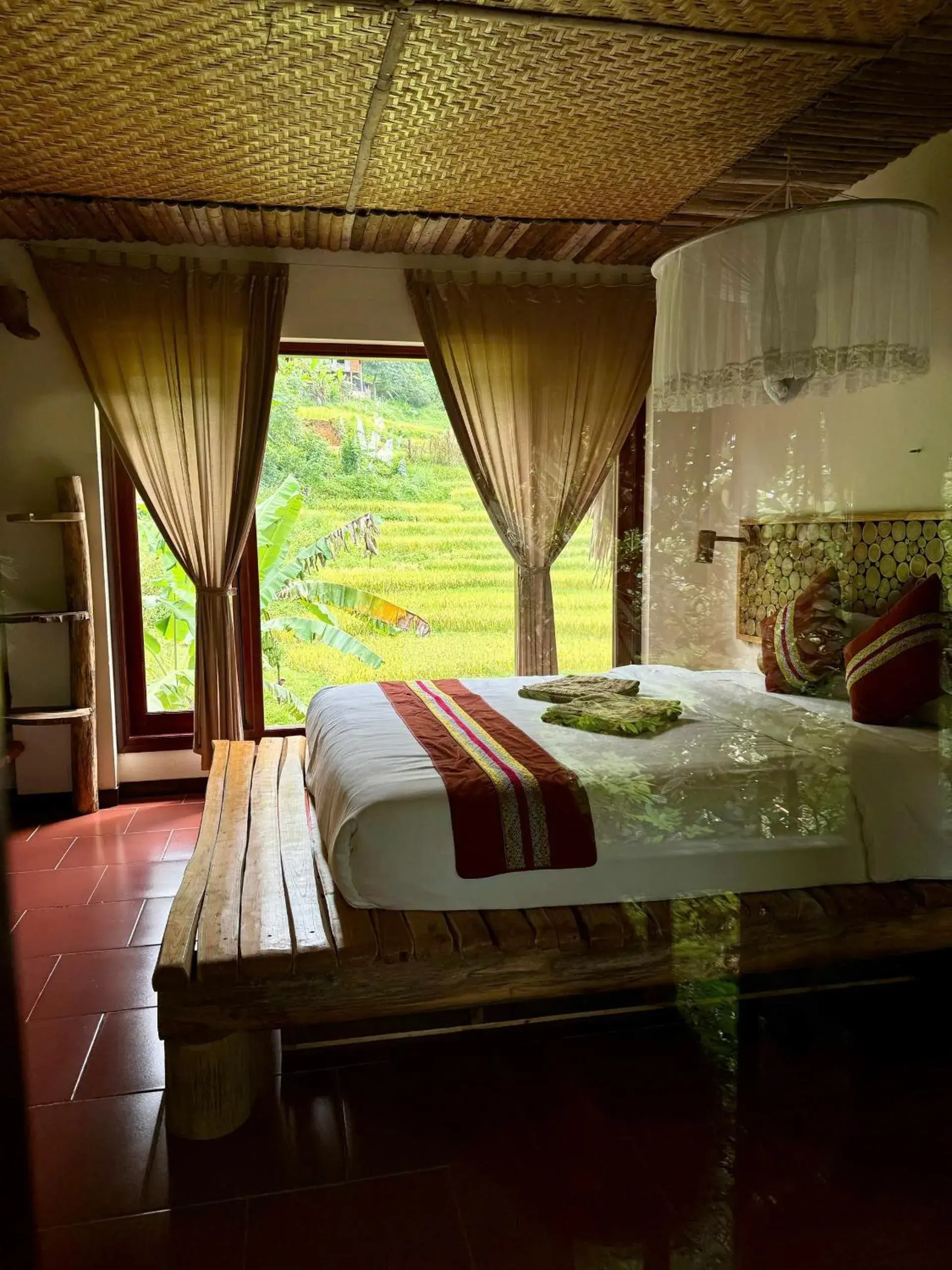 Triple Room with Balcony and Field View in Pu Luong Jungle Lodge Triple Room with Balcony and Field View in Pu Luong Jungle Lodge
