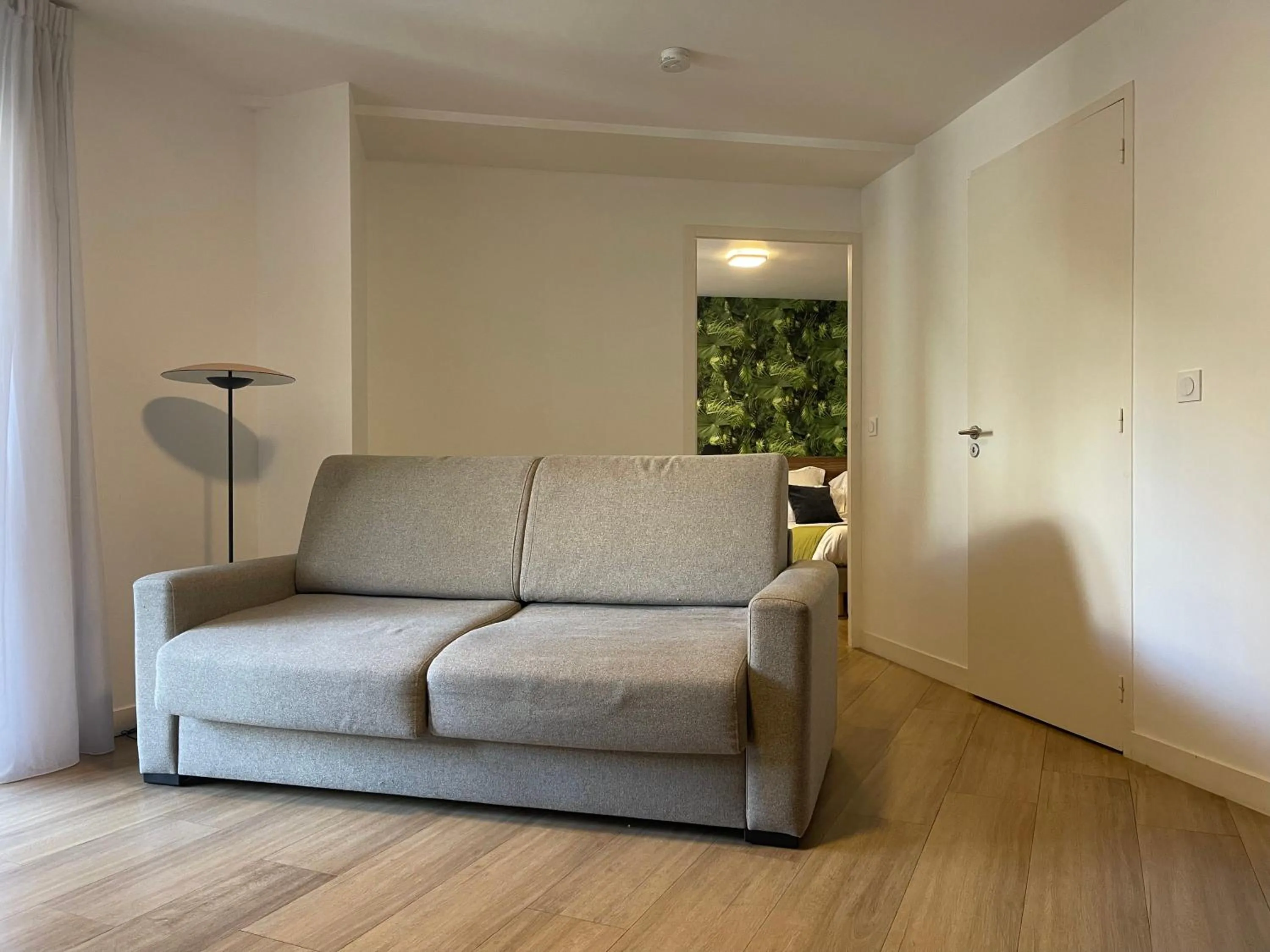 Living room in ATHOME RESIDENCE ET SPA