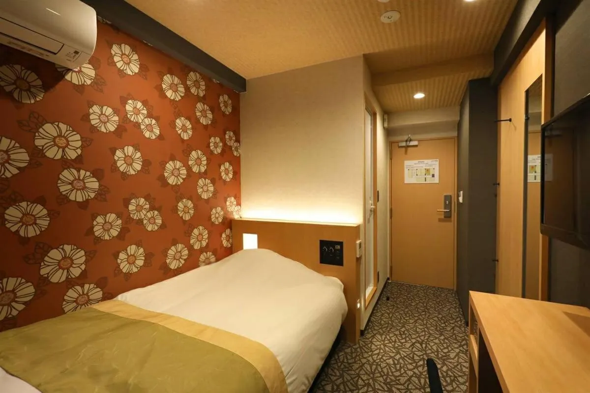 Bed in Hotel Matsunoi