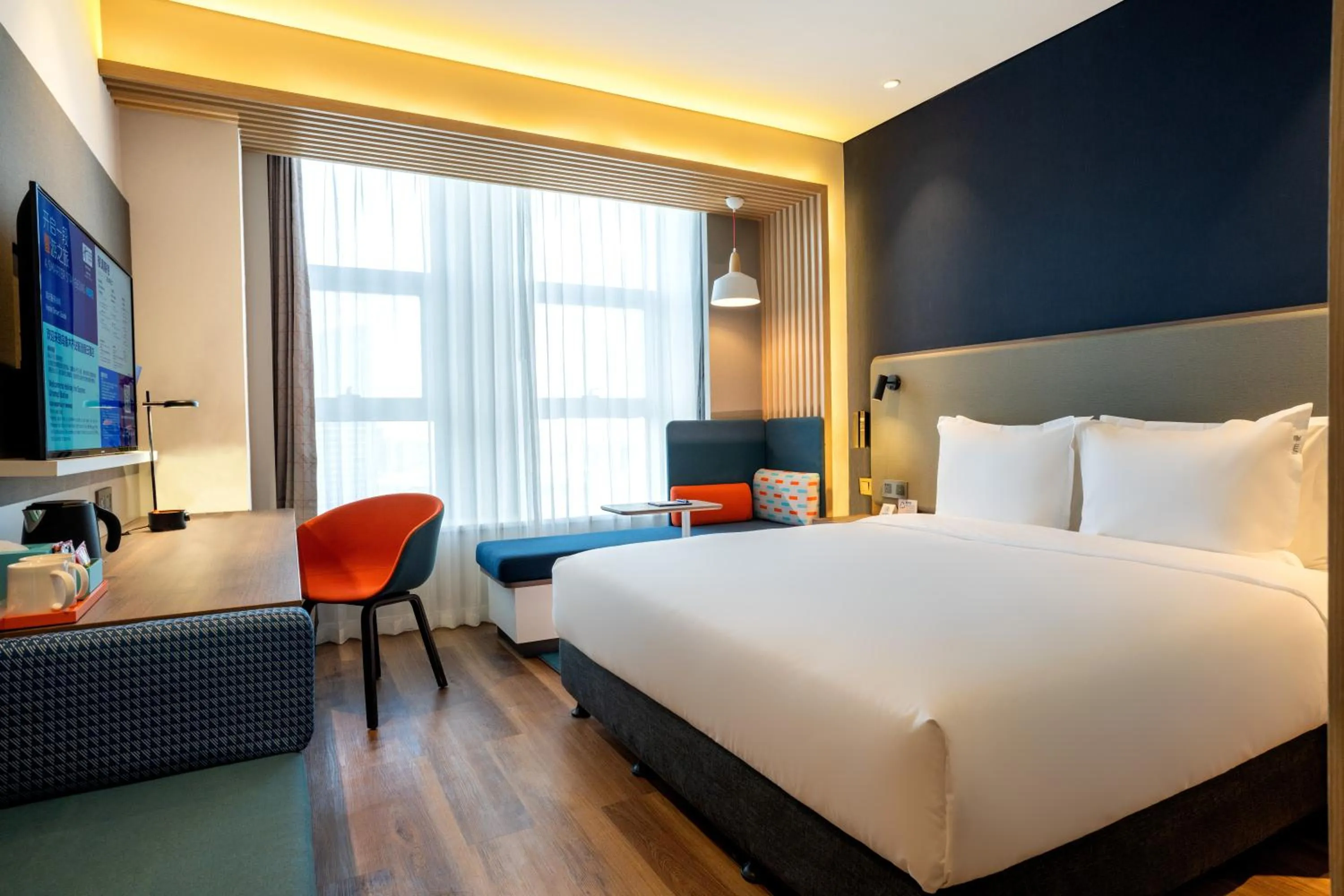 Photo of the whole room, Bed in Holiday Inn Express Urumqi Station by IHG