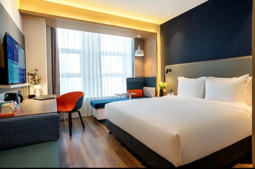 Photo of the whole room, Bed in Holiday Inn Express Urumqi Station by IHG Photo of the whole room, Bed in Holiday Inn Express Urumqi Station by IHG