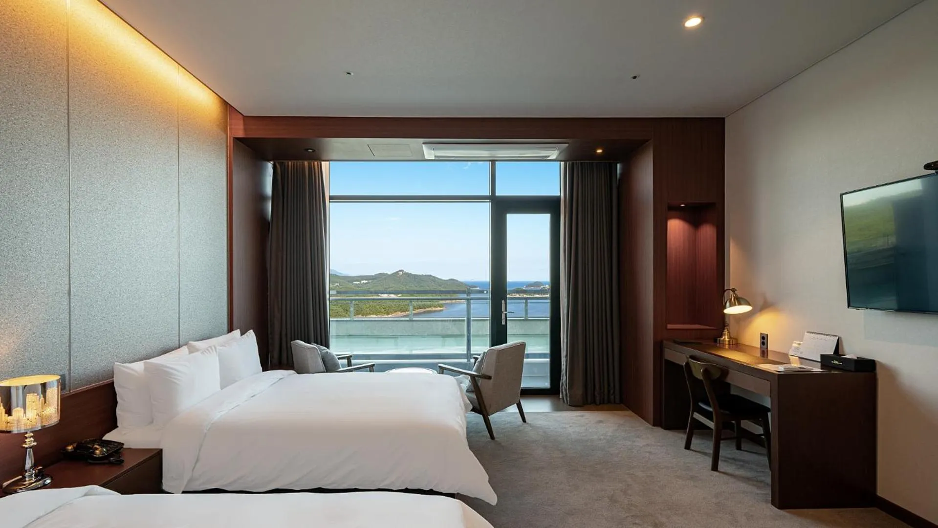 Bed in Hotel JCS Yeosu