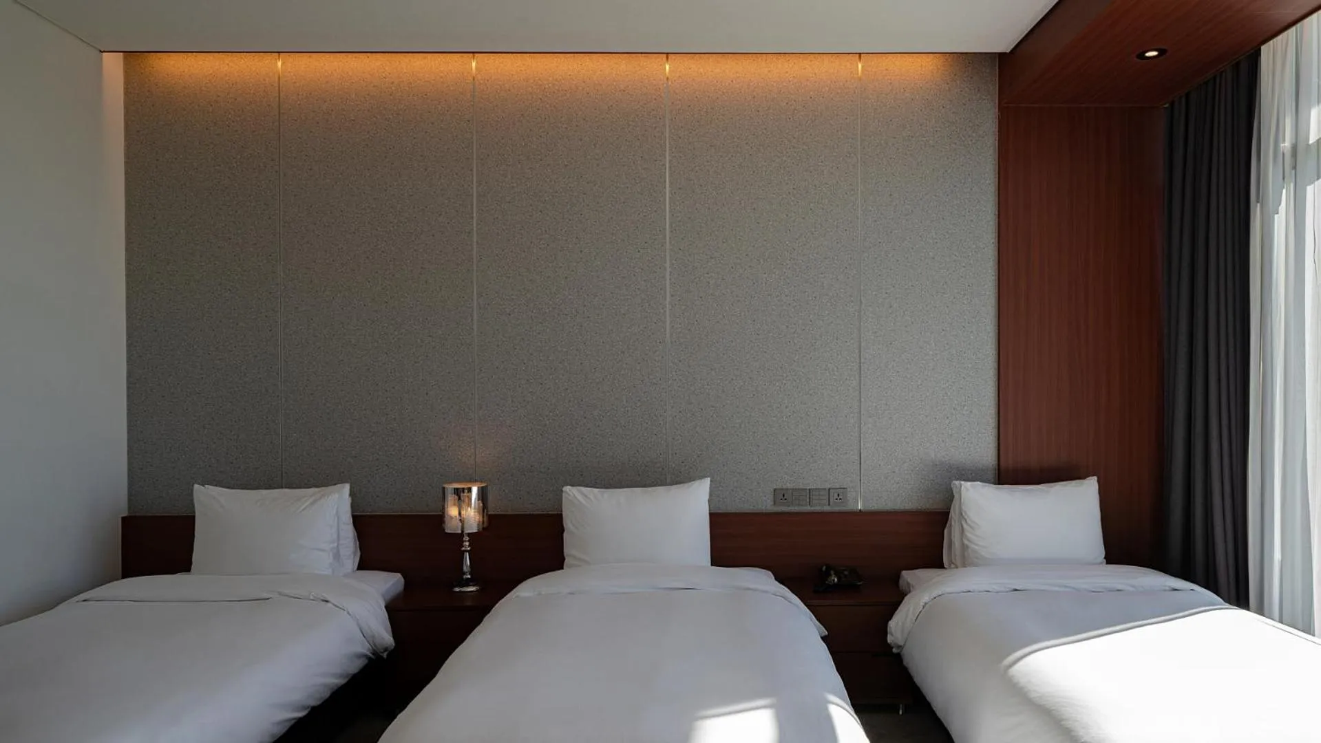 Bed in Hotel JCS Yeosu