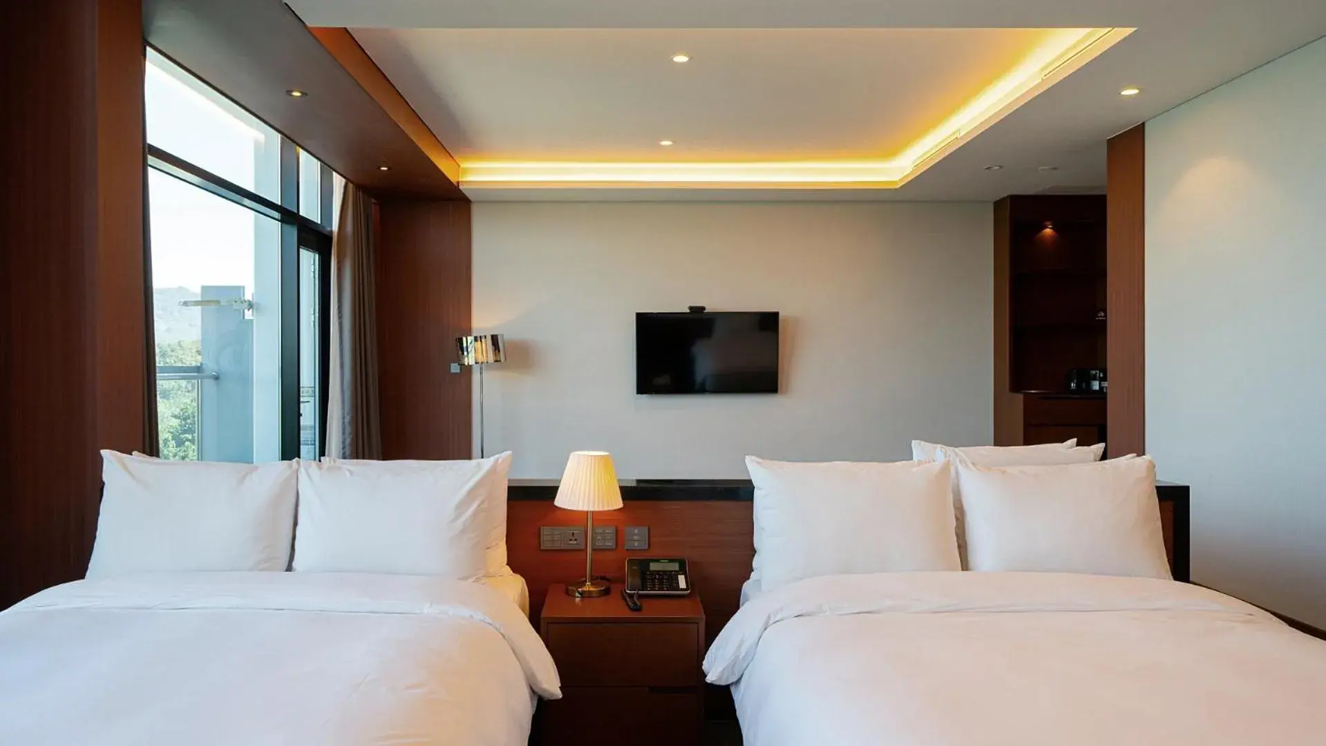 Bed in Hotel JCS Yeosu Bed in Hotel JCS Yeosu