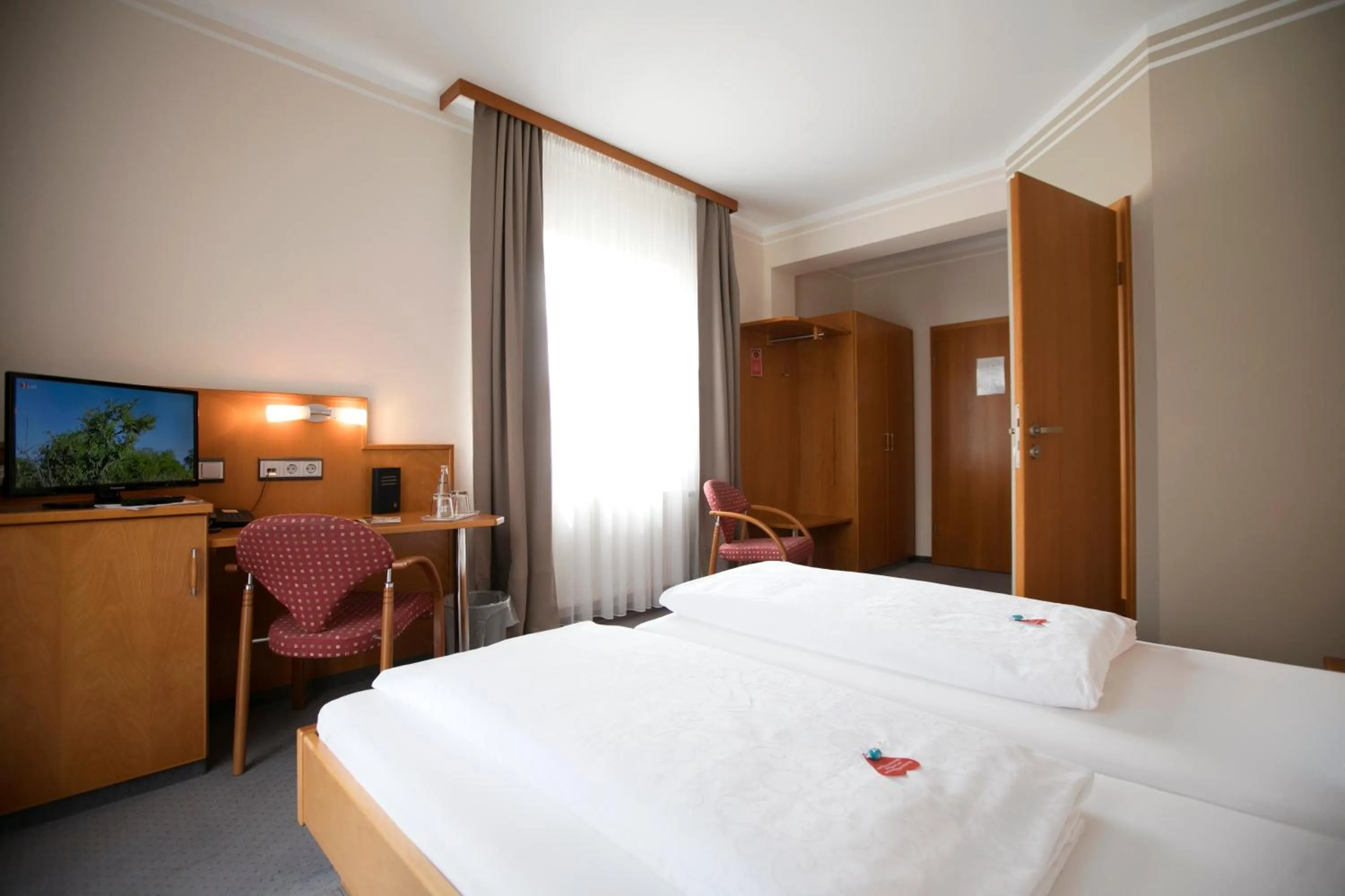 Bed in Neumaiers Hirsch -Gasthof und Landhotel