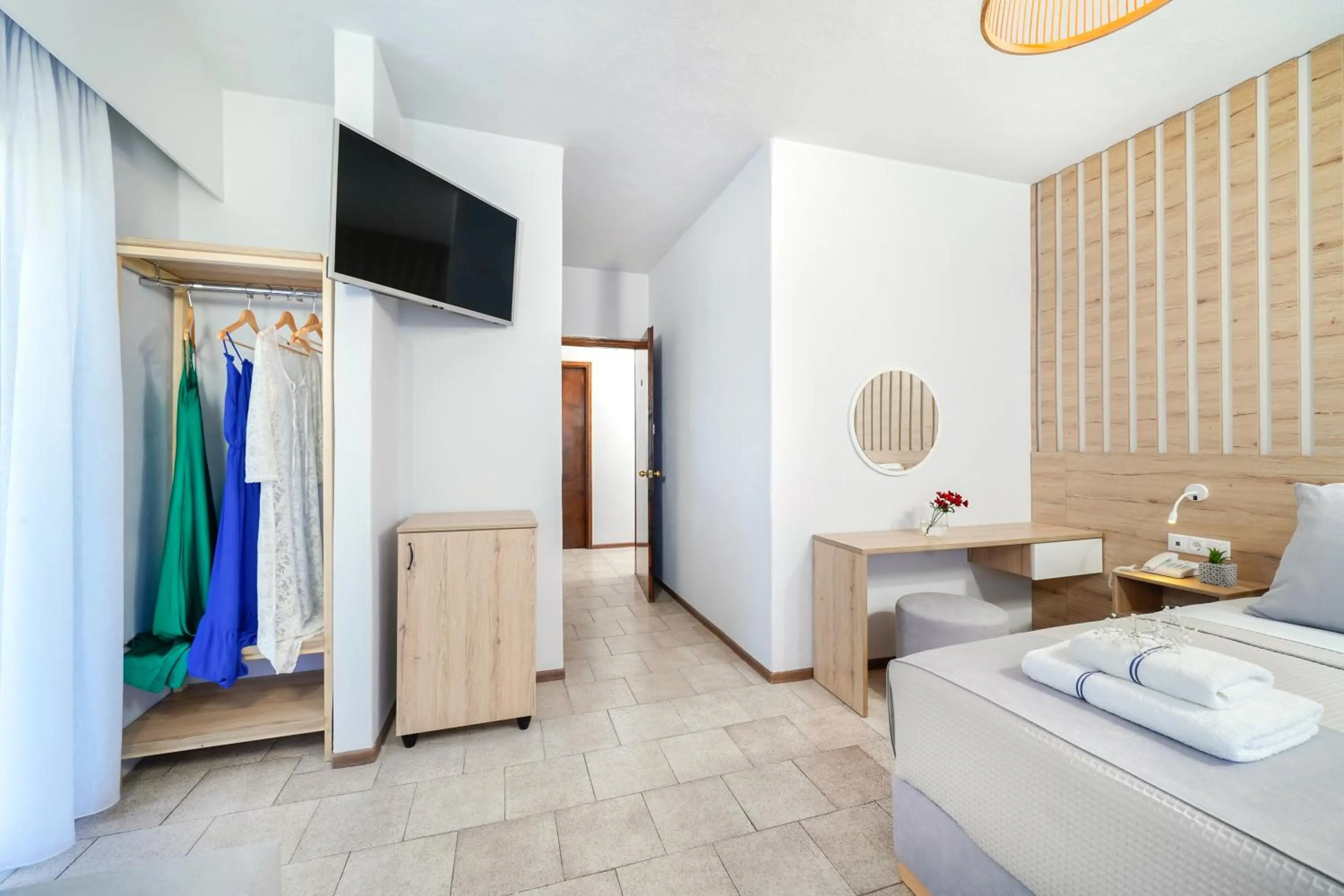 Bed in Nefeli Fresh Hotel by Del Mare