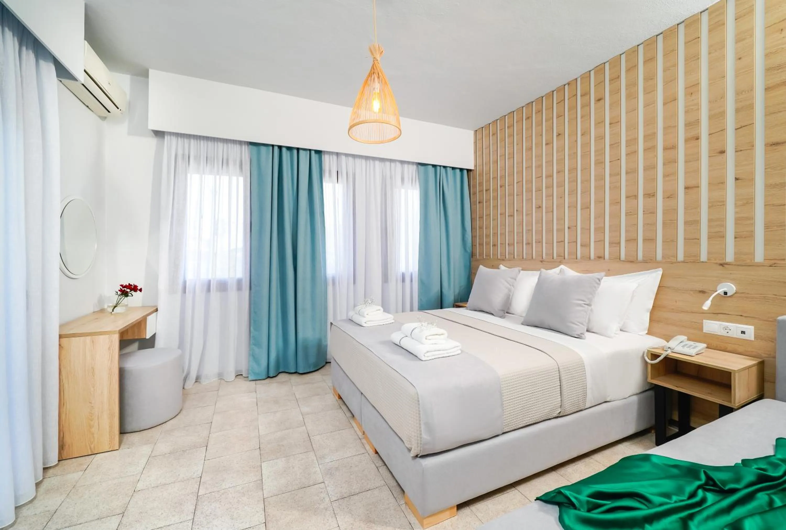 Bed in Nefeli Fresh Hotel by Del Mare