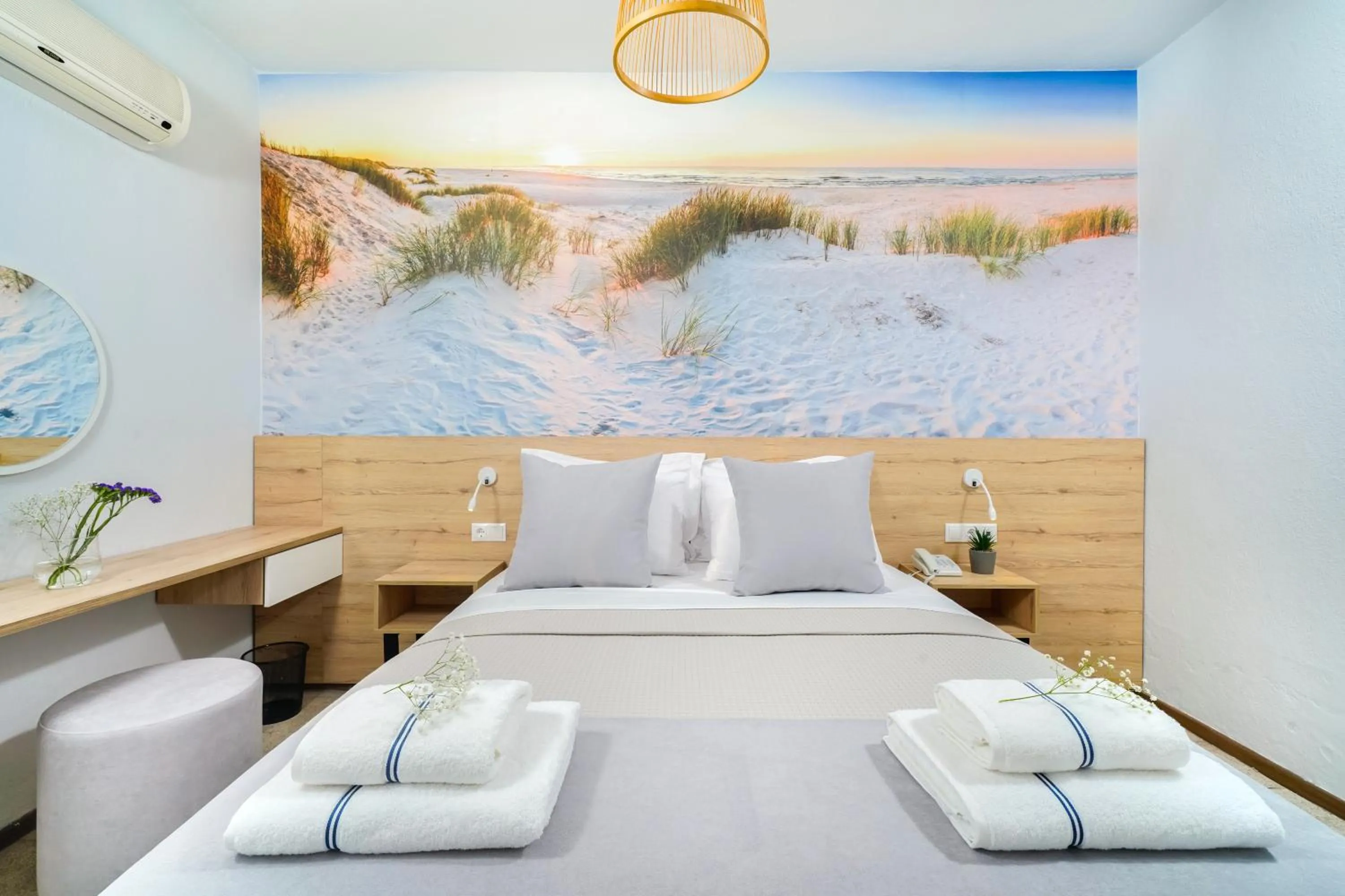 Bed in Nefeli Fresh Hotel by Del Mare