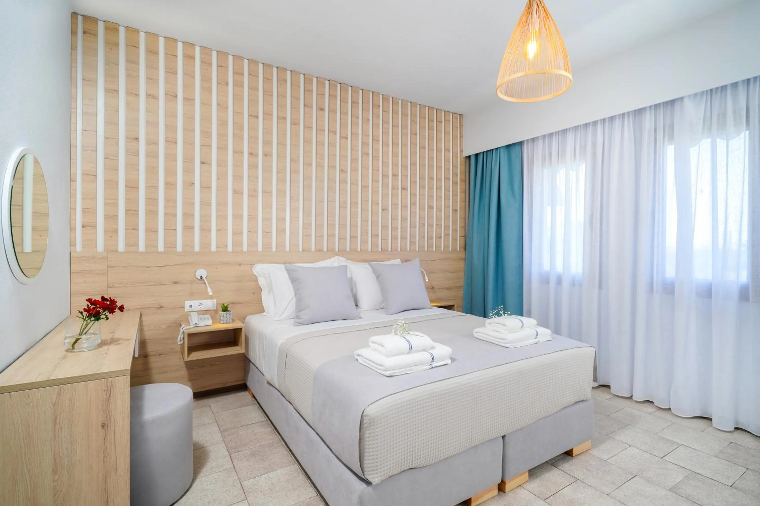 Bed in Nefeli Fresh Hotel by Del Mare