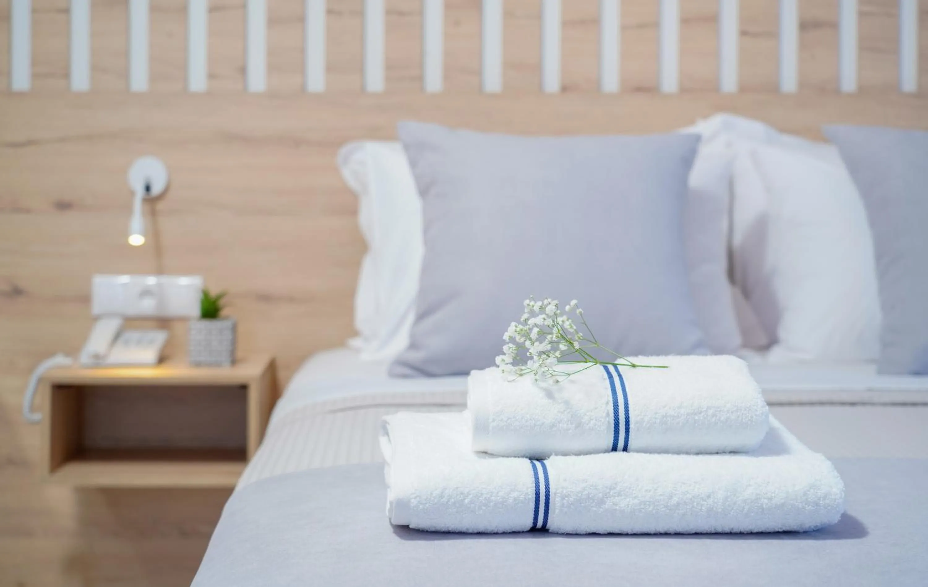 Bed in Nefeli Fresh Hotel by Del Mare