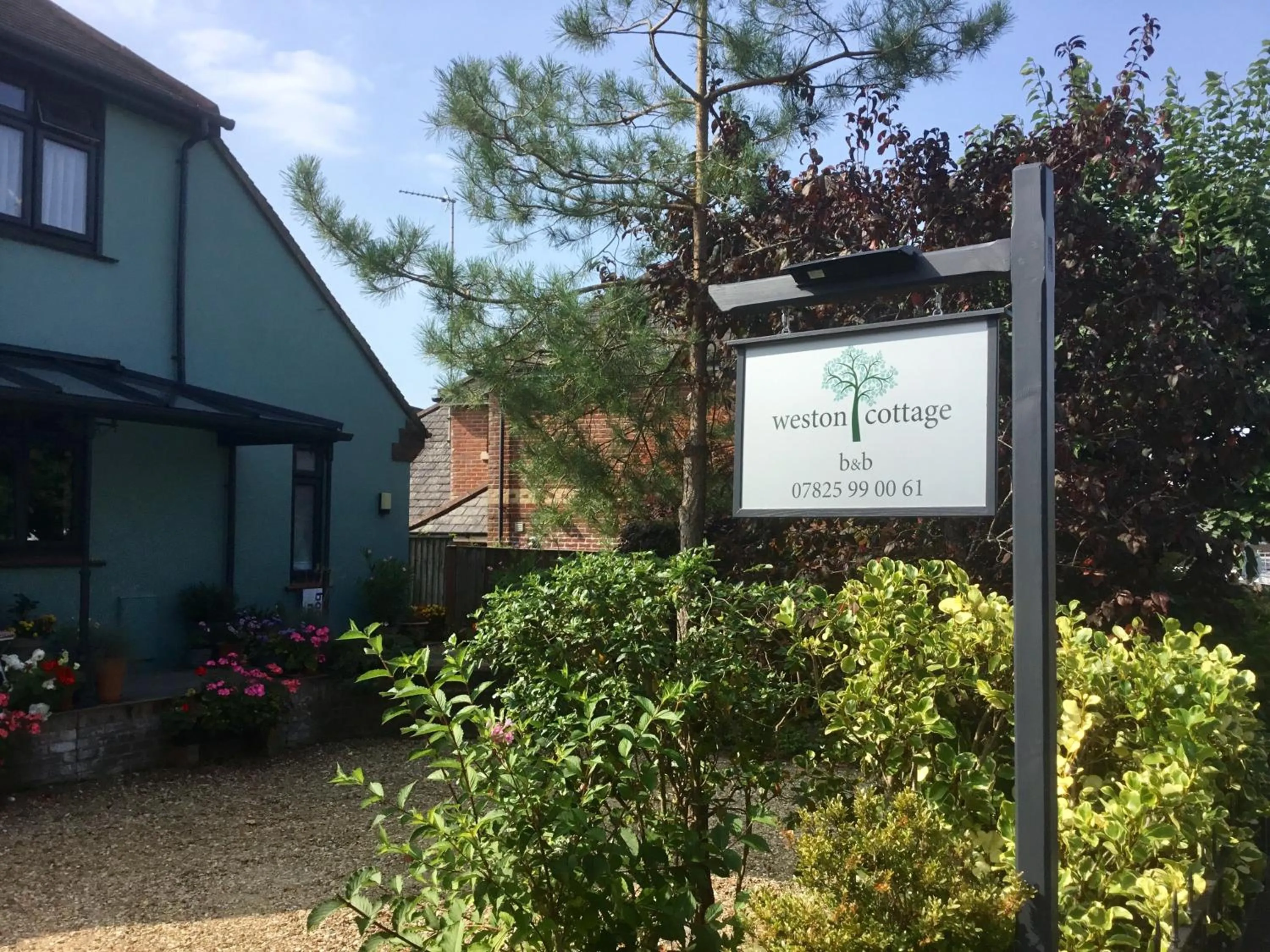 Property logo or sign in Weston Cottage