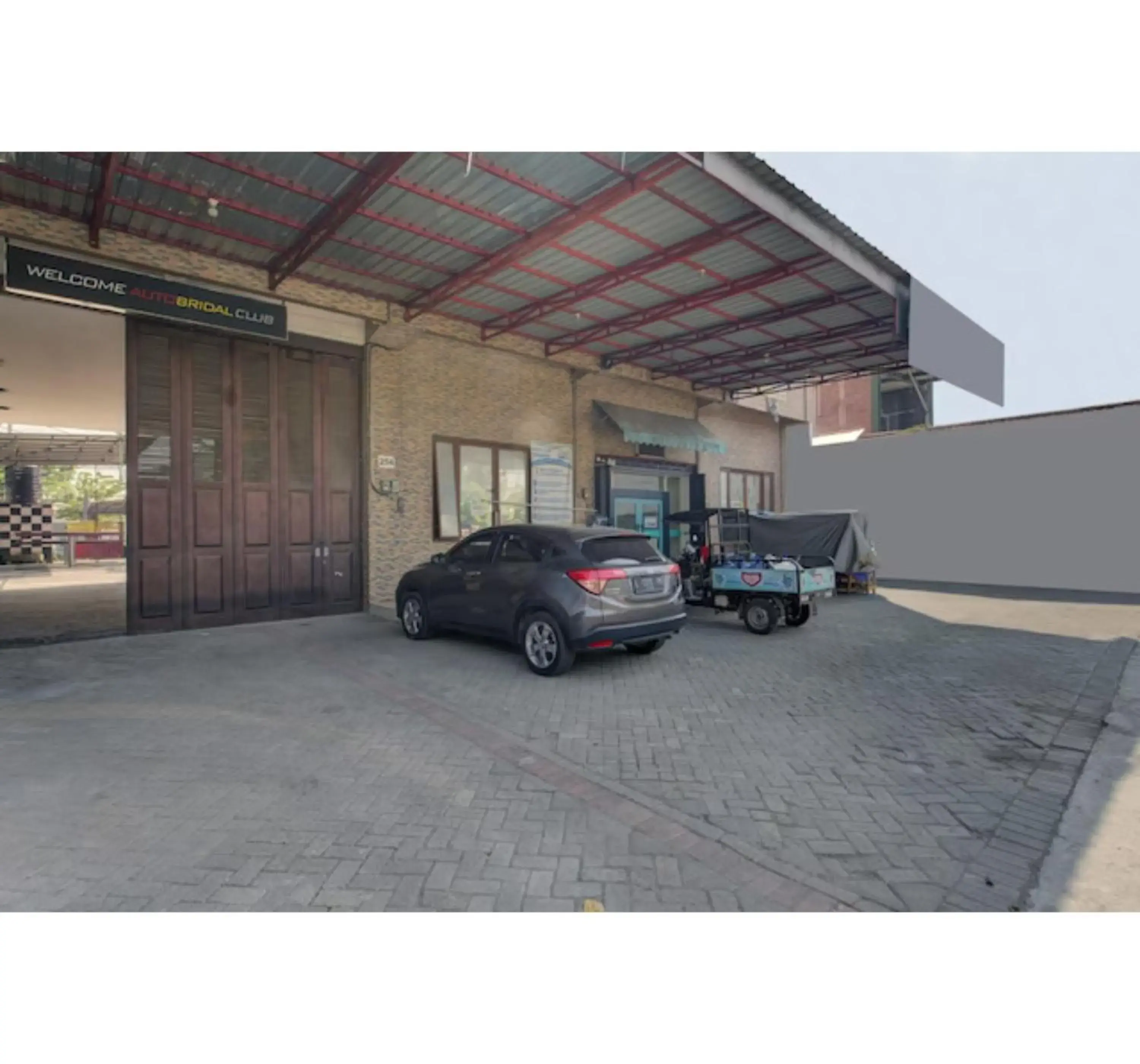 Facade/entrance in Capital O 3198 Sukomanunggal Inn Facade/entrance in Capital O 3198 Sukomanunggal Inn