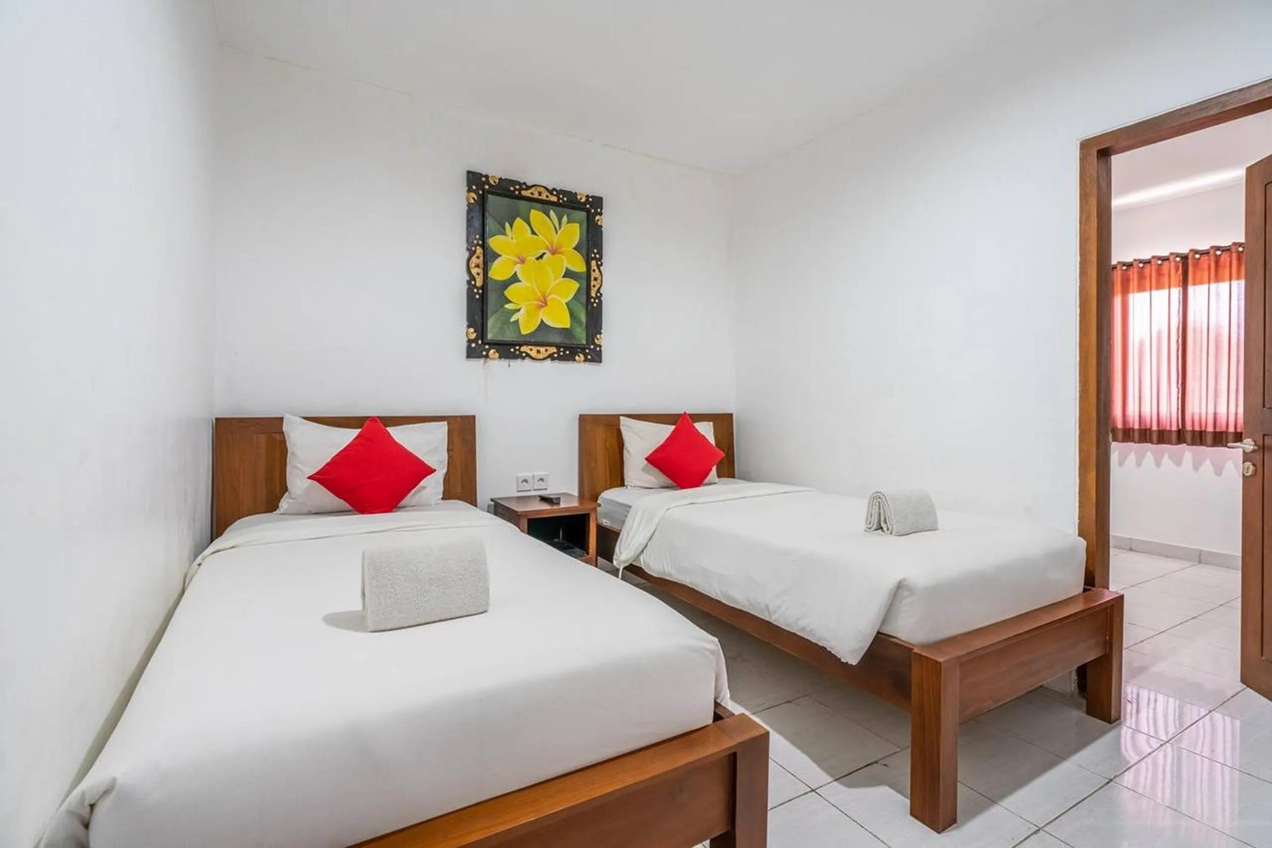 Photo of the whole room, Bed in Ganandra Stay Denpasar