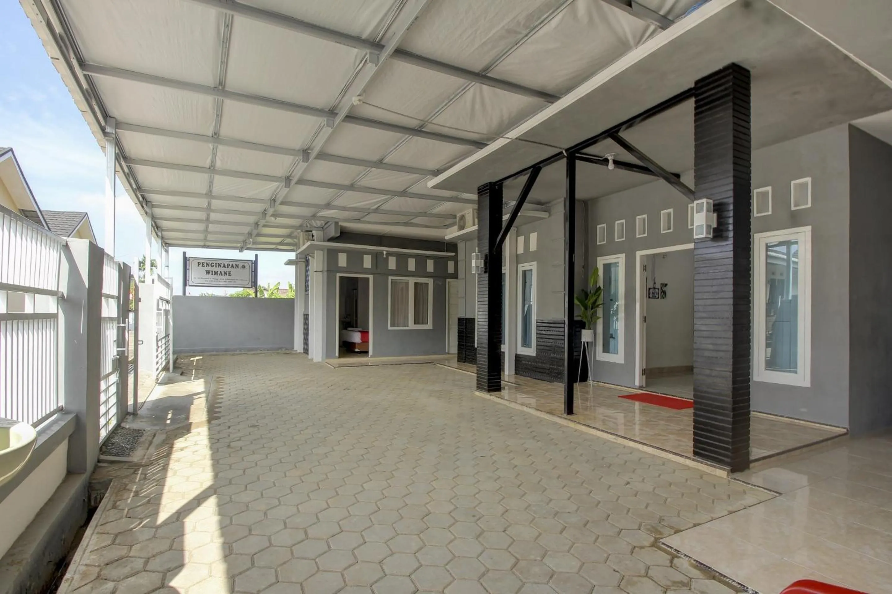 Facade/entrance in OYO Life 3415 Penginapan Wimane