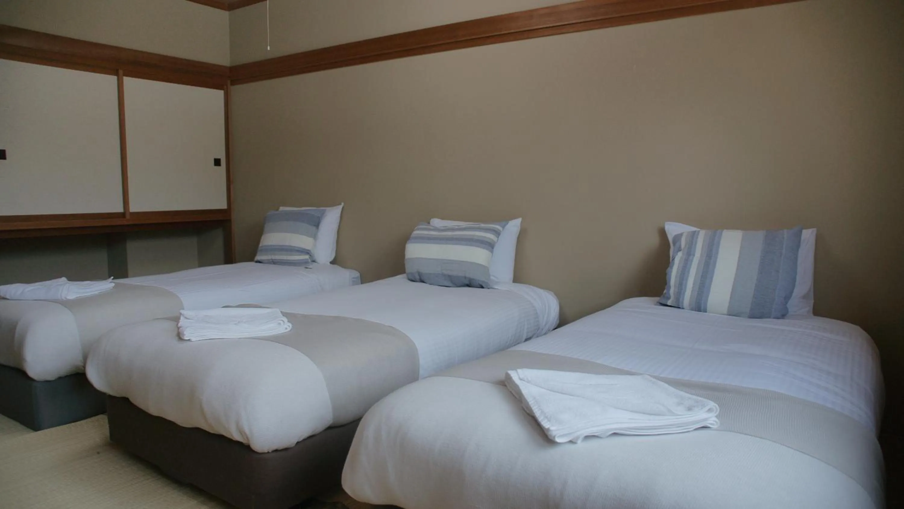 Bed in Red Fox Lodge Myoko