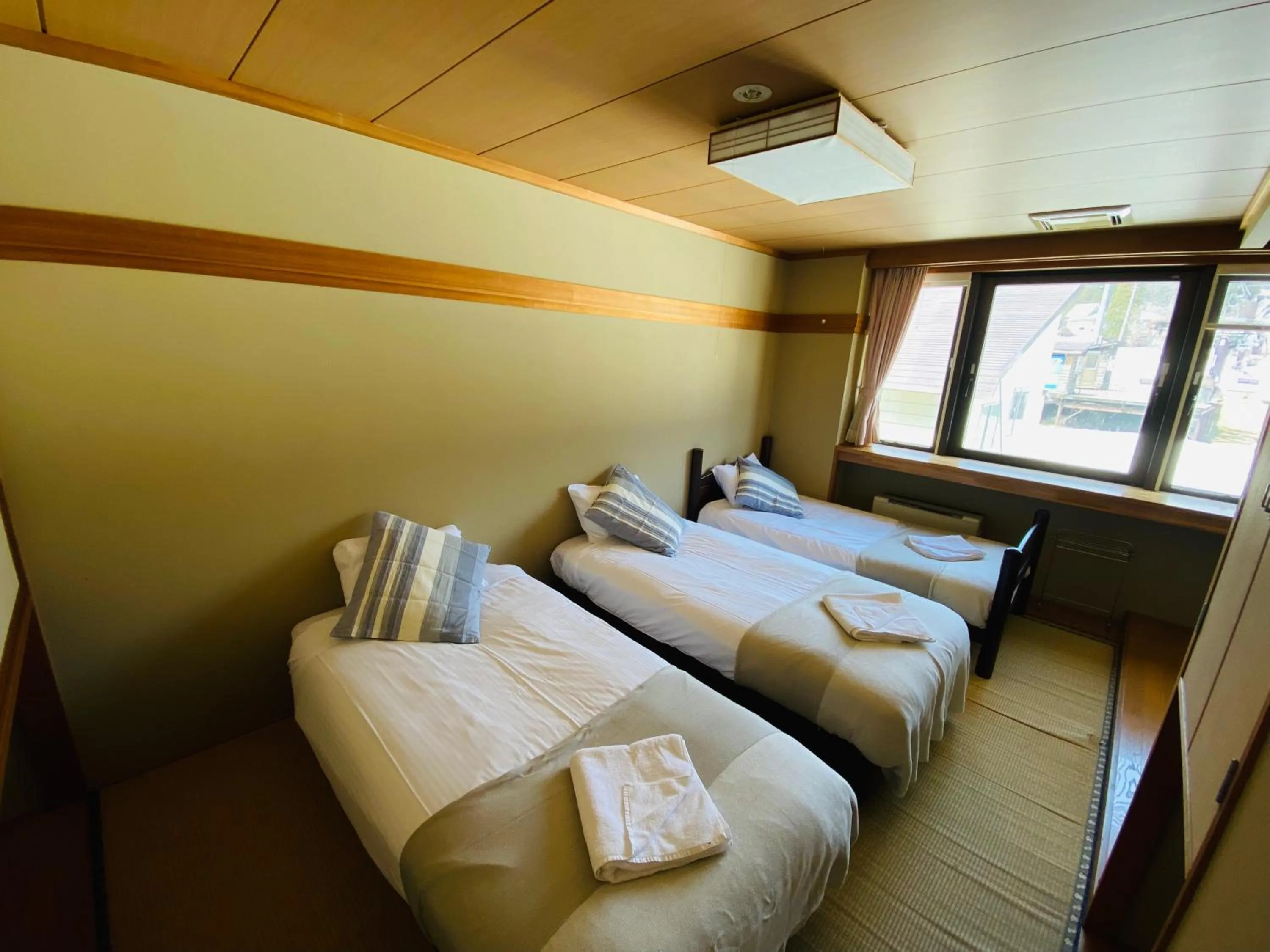 Bedroom, Bed in Red Fox Lodge Myoko