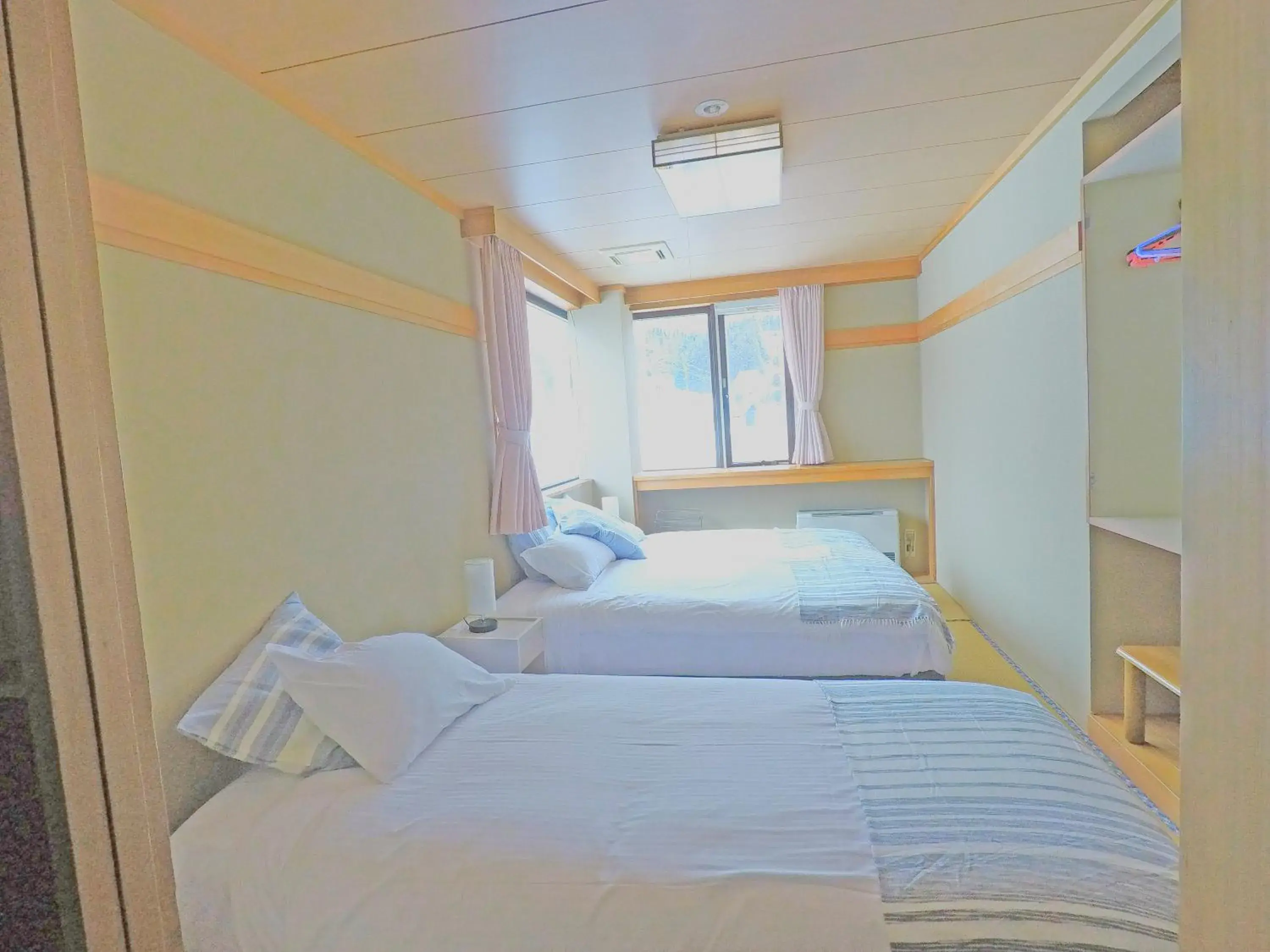 Triple Room with Shared Bathroom in Red Fox Lodge Myoko Triple Room with Shared Bathroom in Red Fox Lodge Myoko