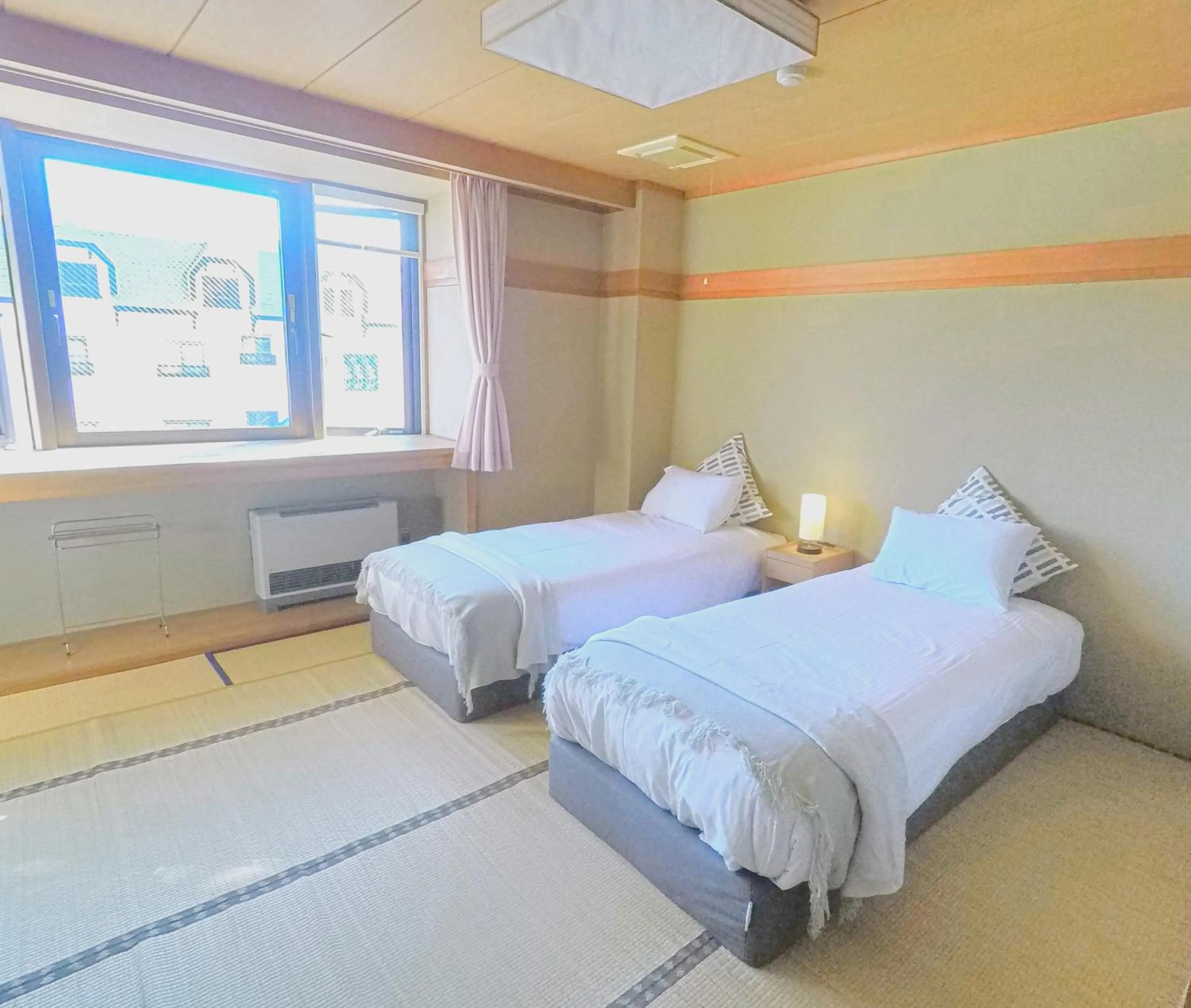 Bed in Red Fox Lodge Myoko