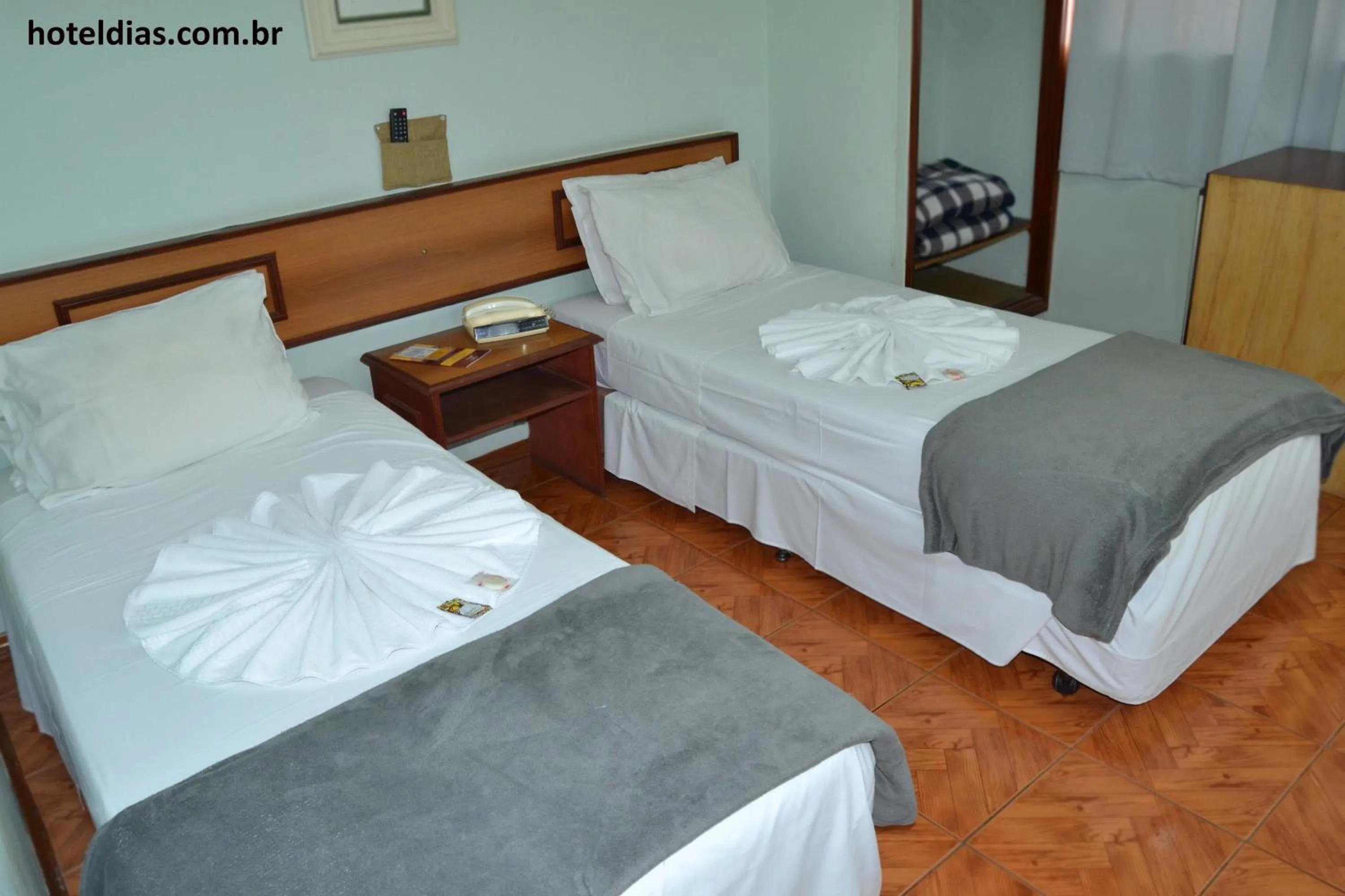 Photo of the whole room, Bed in Hotel Dias em Pouso Alegre - MG - Próximo a Centros Comerciais e Restaurantes