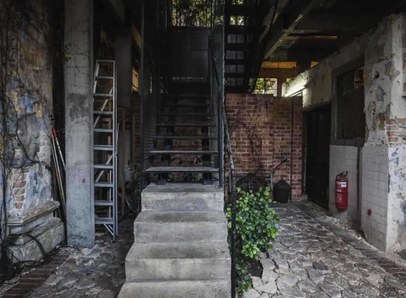 Facade/entrance in Belakang KongHeng By DreamScape Facade/entrance in Belakang KongHeng By DreamScape