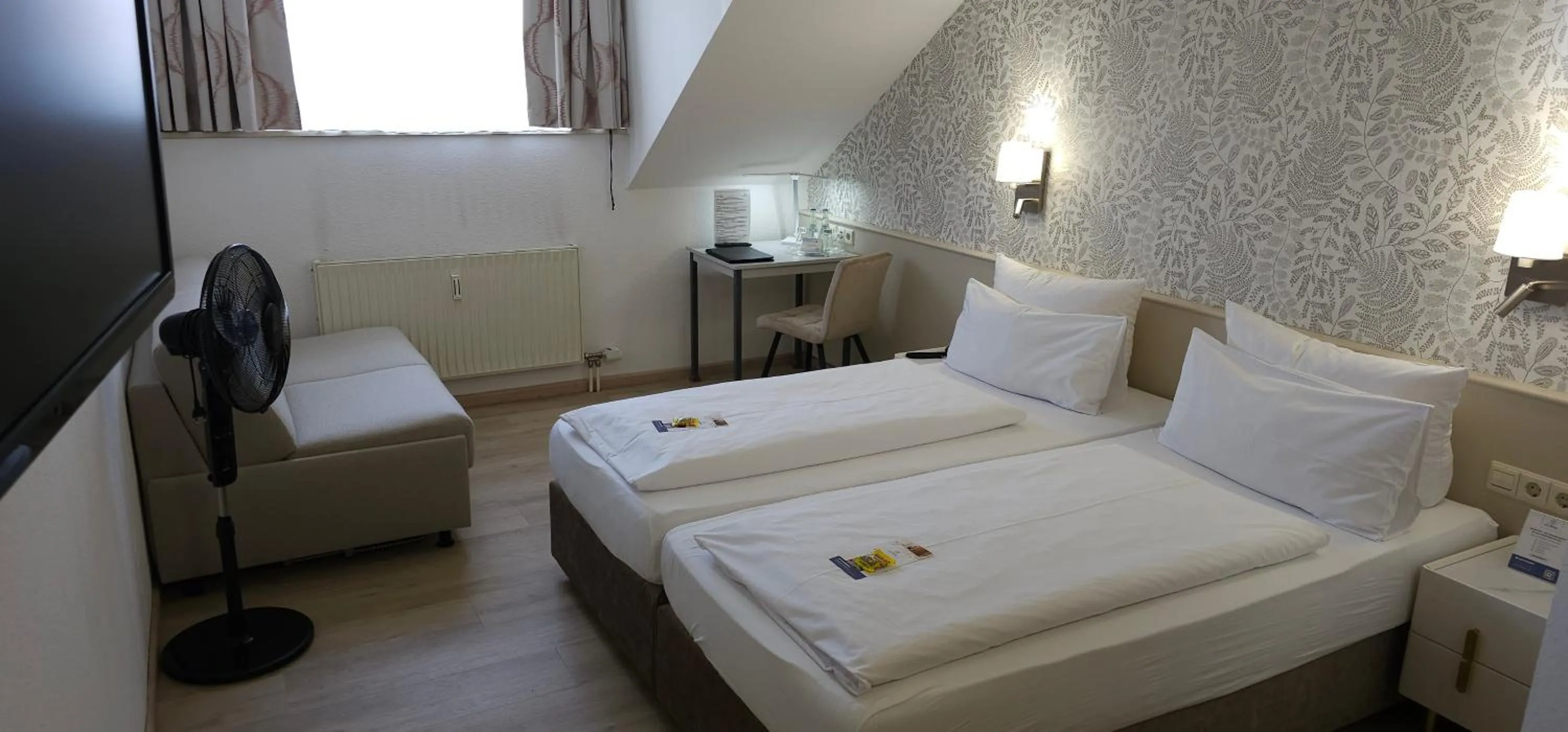 Seating area, Bed in Hotel Löwen