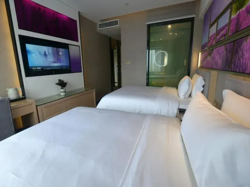 Bed in Lavande Hotel Zhangjiajie Tianmenshan Dayongfucheng Bed in Lavande Hotel Zhangjiajie Tianmenshan Dayongfucheng