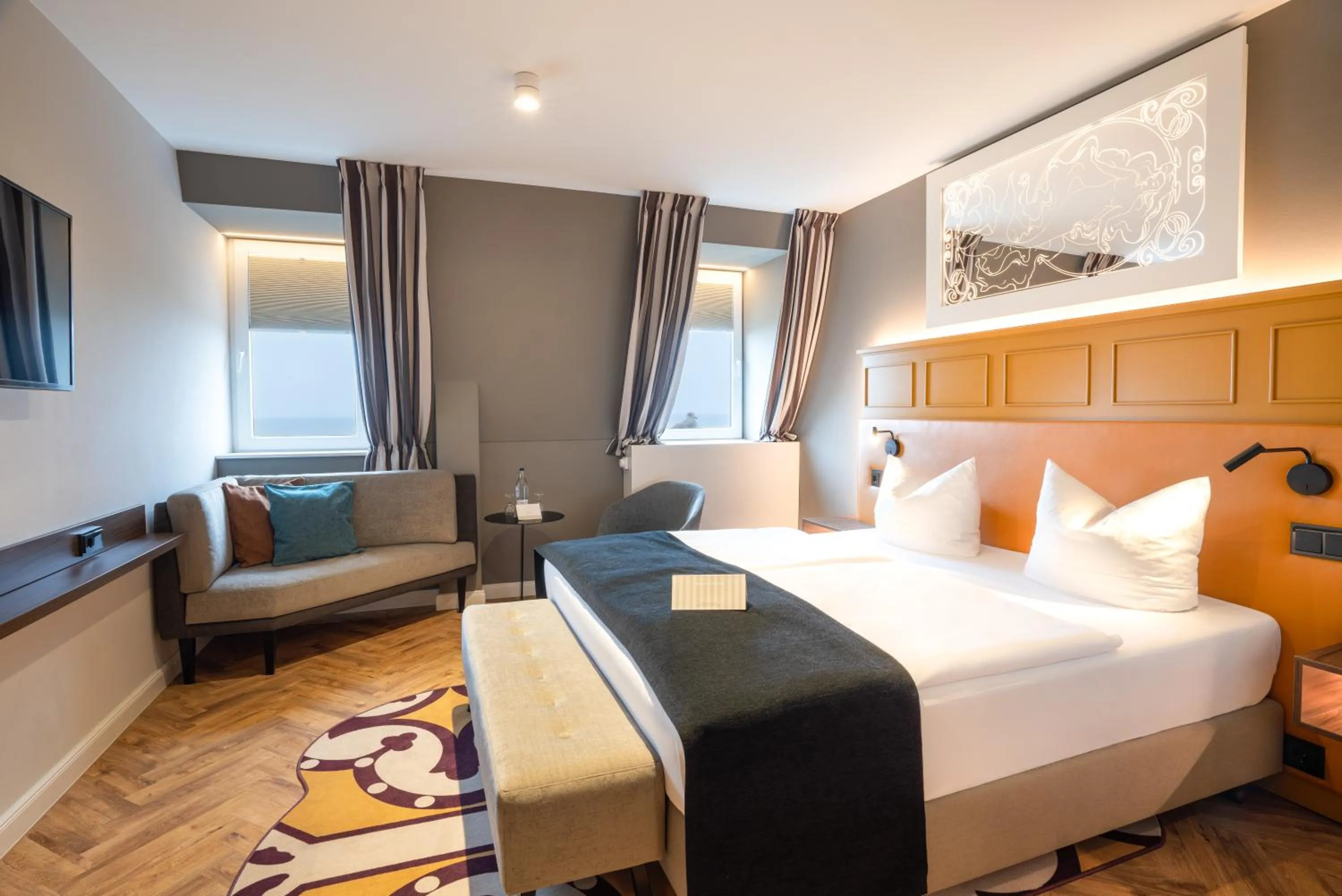 Photo of the whole room, Bed in SEETELHOTEL Ostseehotel das Entdeckerhotel an der Ostsee und der perfekte Startpunkt für Ihre Inselabenteuer