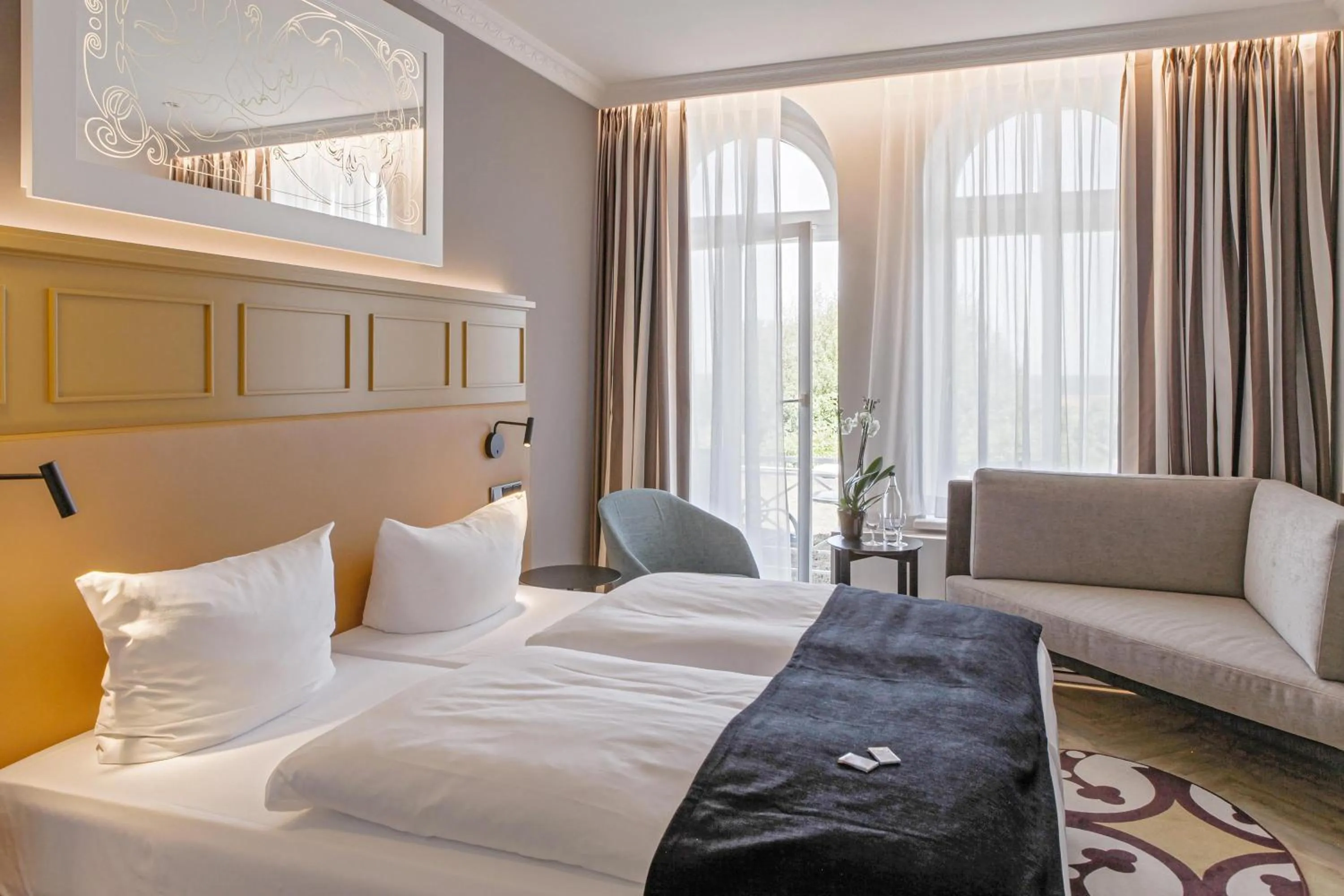 Photo of the whole room, Bed in SEETELHOTEL Ostseehotel das Entdeckerhotel an der Ostsee und der perfekte Startpunkt für Ihre Inselabenteuer