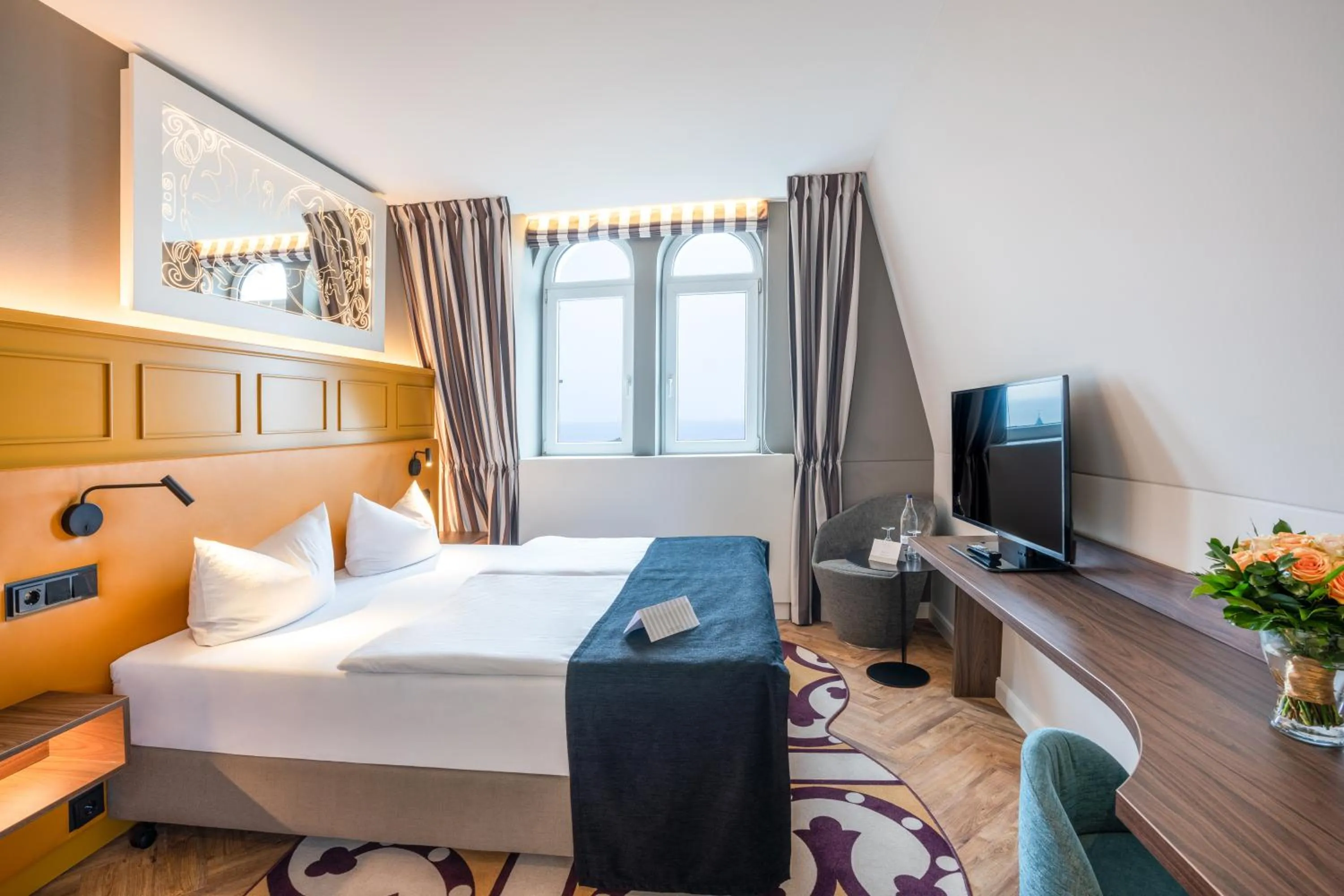 Photo of the whole room, Bed in SEETELHOTEL Ostseehotel das Entdeckerhotel an der Ostsee und der perfekte Startpunkt für Ihre Inselabenteuer